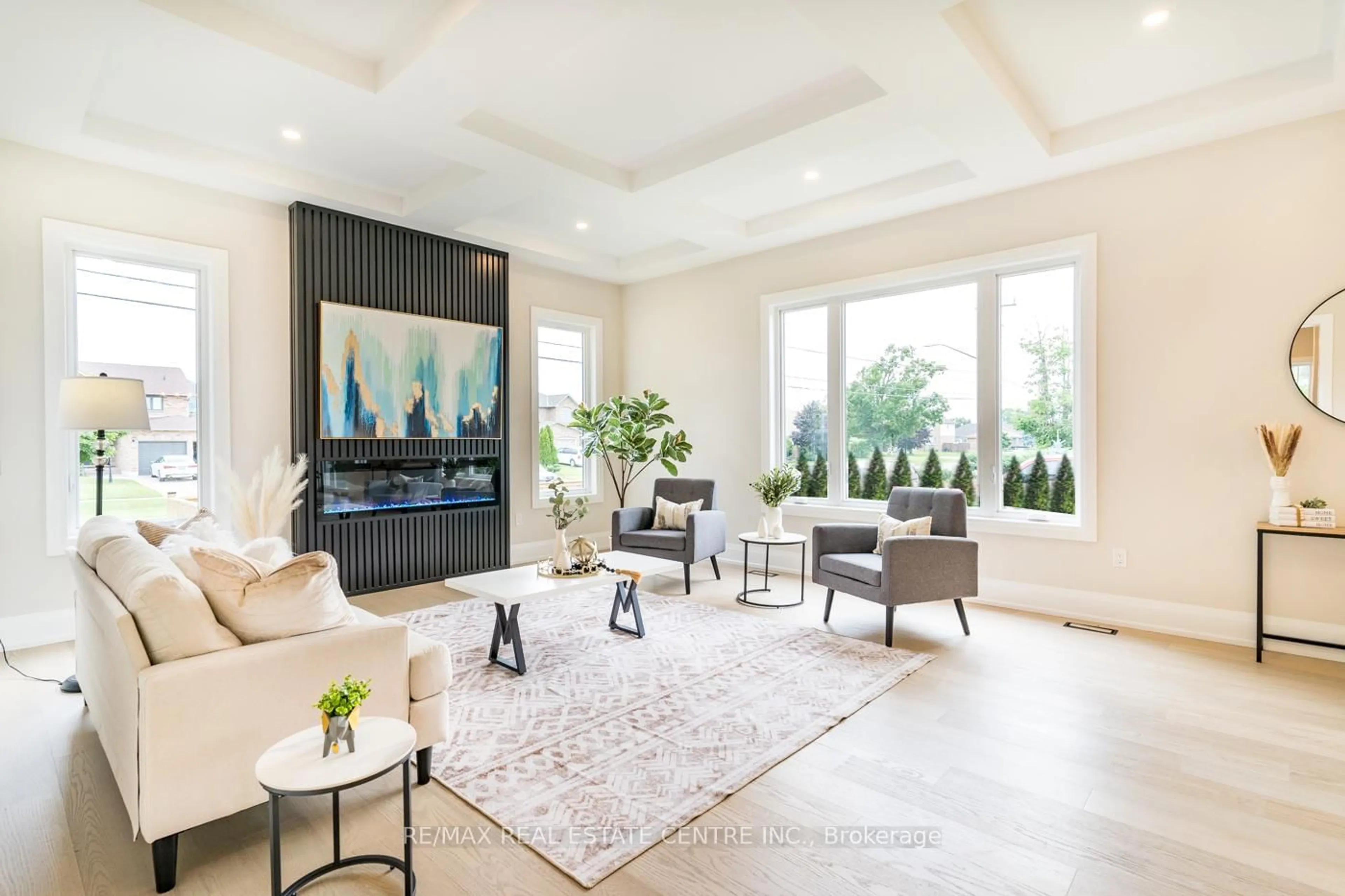 Living room with furniture, ceramic/tile floor for 1 West Ave, Hamilton Ontario L8E 5L5