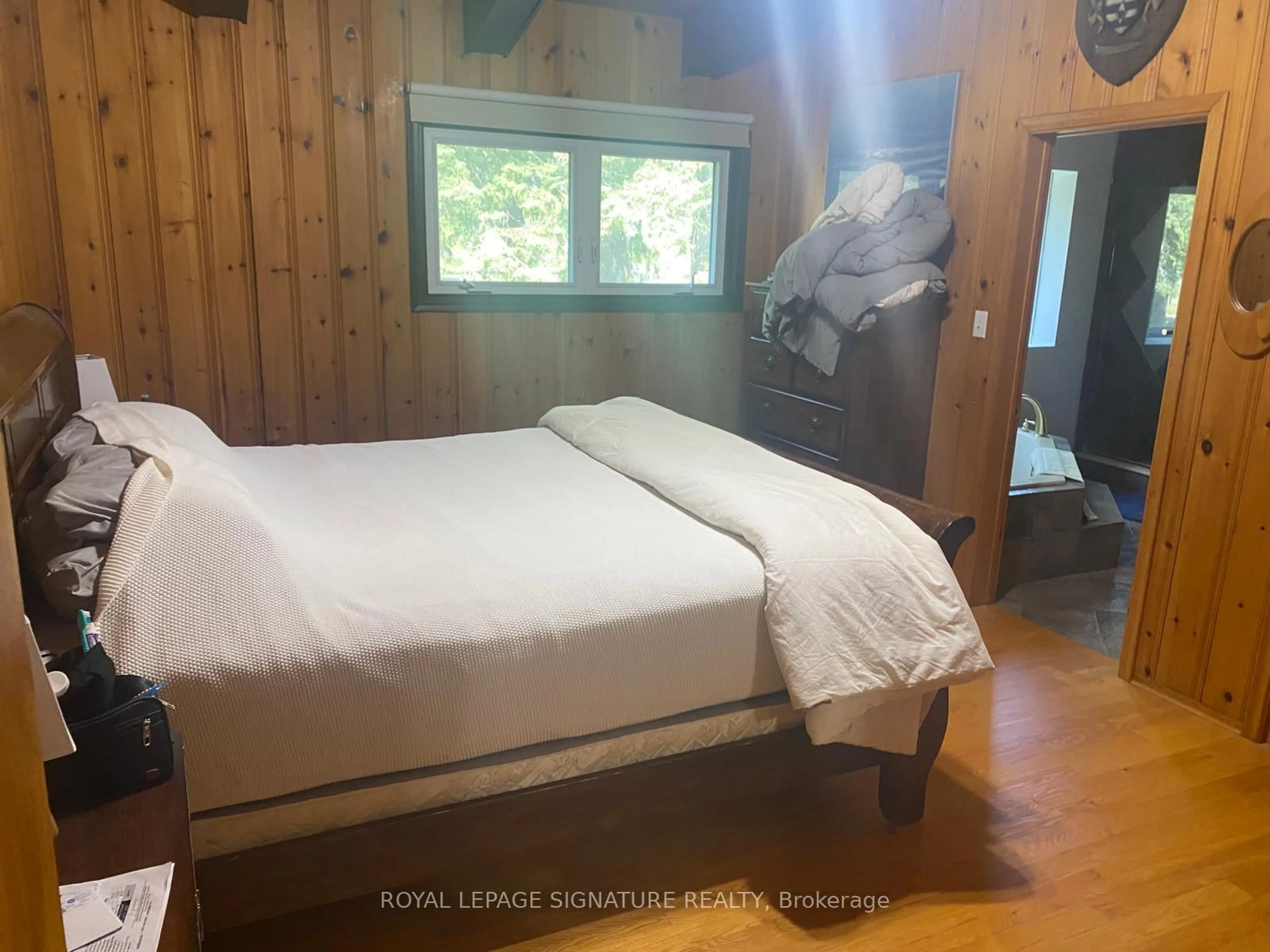 Bedroom with bed, wood/laminate floor for 9077 Wellington Rd #No. 22, Erin Ontario N0B 1Z0
