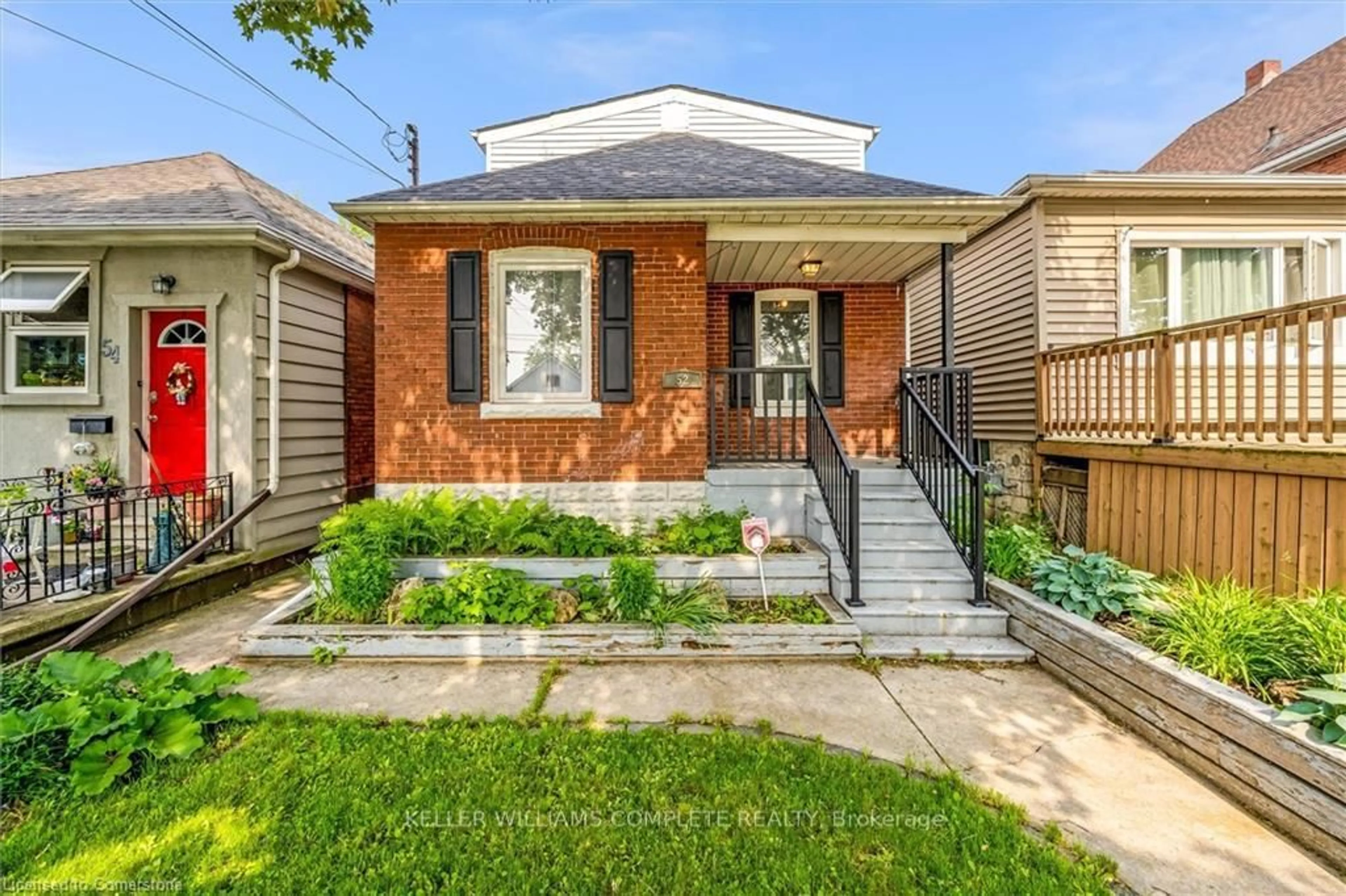 Home with brick exterior material, street for 52 East 24th St, Hamilton Ontario L8V 2X7