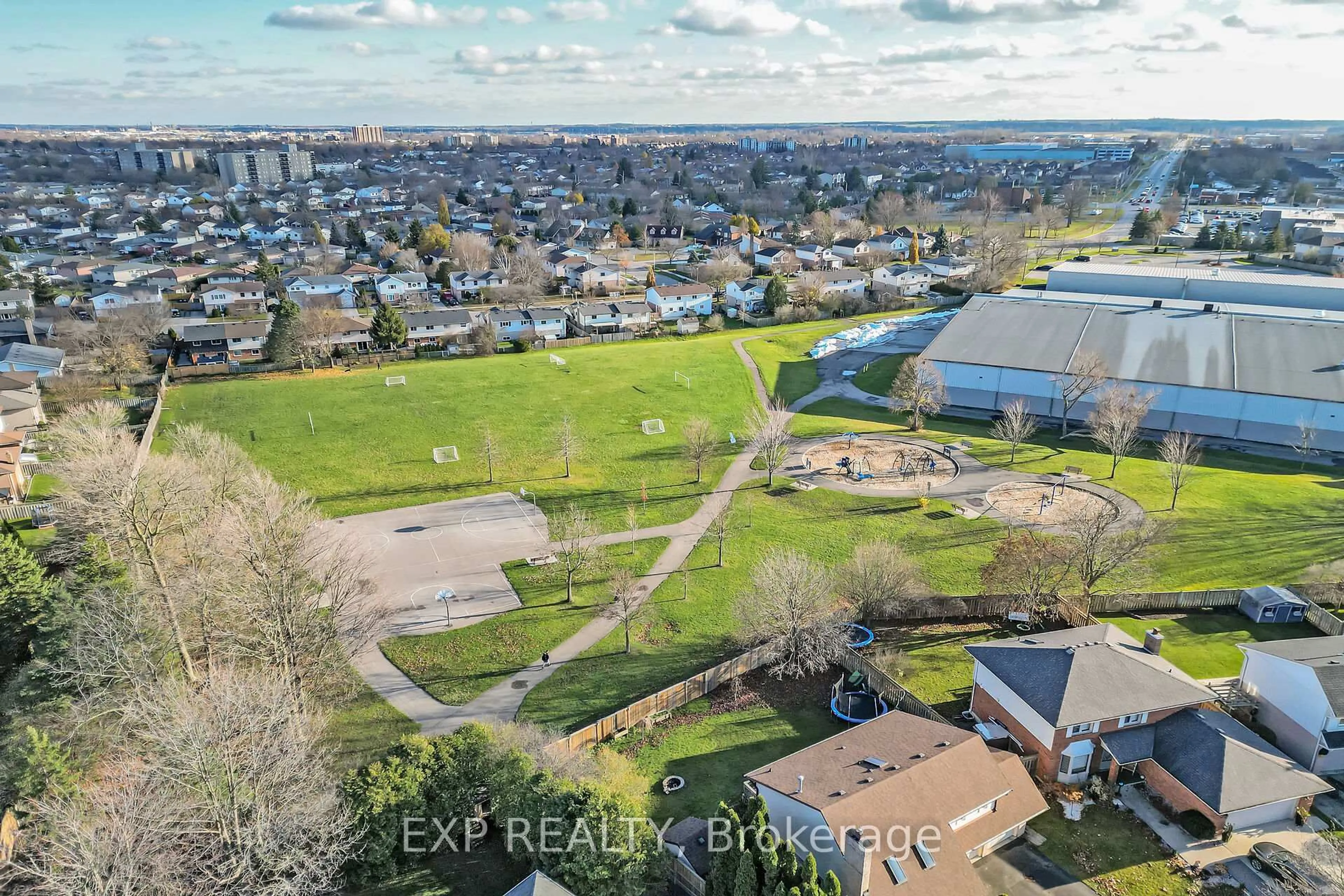 A pic from outside/outdoor area/front of a property/back of a property/a pic from drone, water/lake/river/ocean view for 99 Westwinds Dr, London South Ontario N6C 5M6