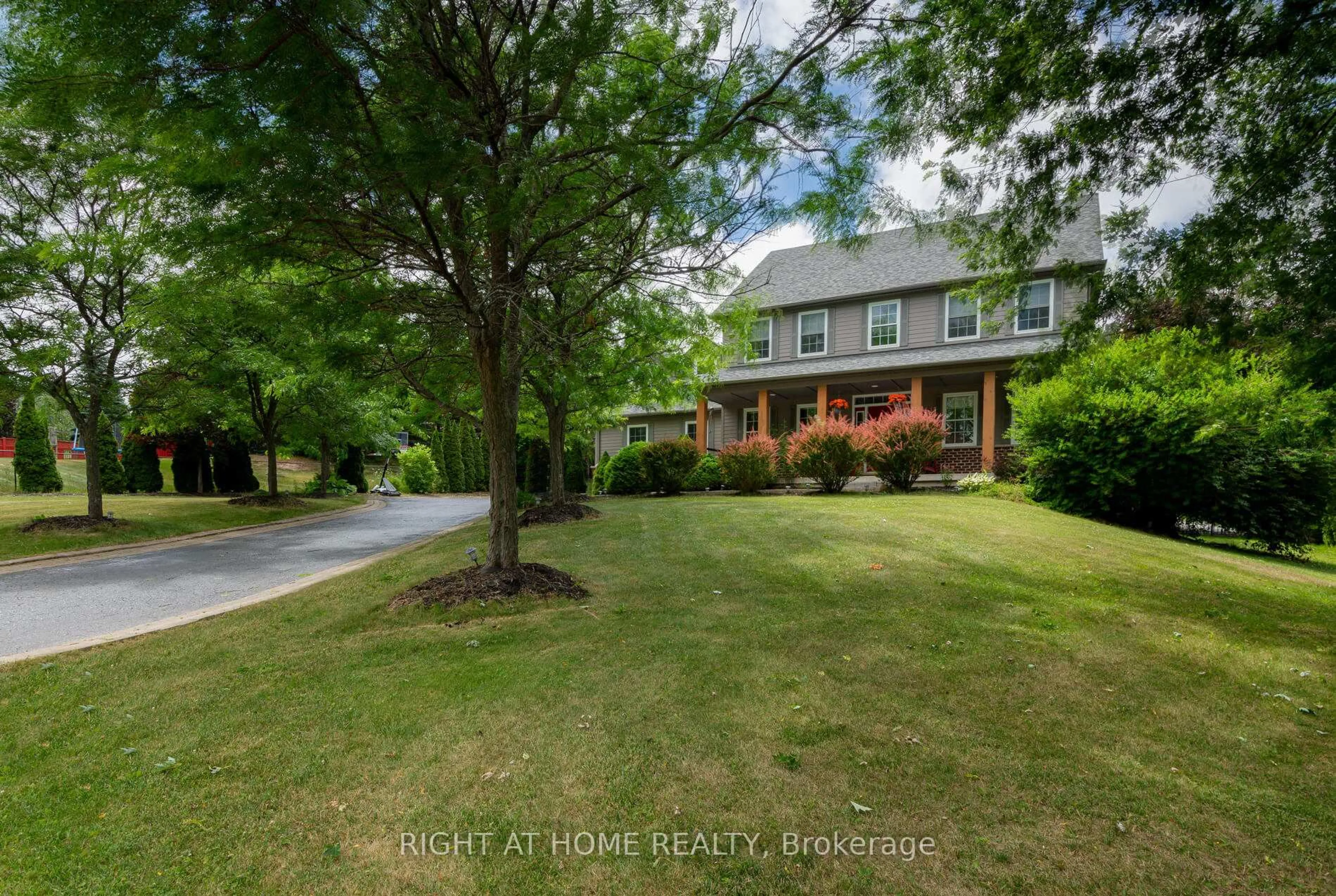 A pic from outside/outdoor area/front of a property/back of a property/a pic from drone, street for 713120 First Line, Mono Ontario L9W 5K4