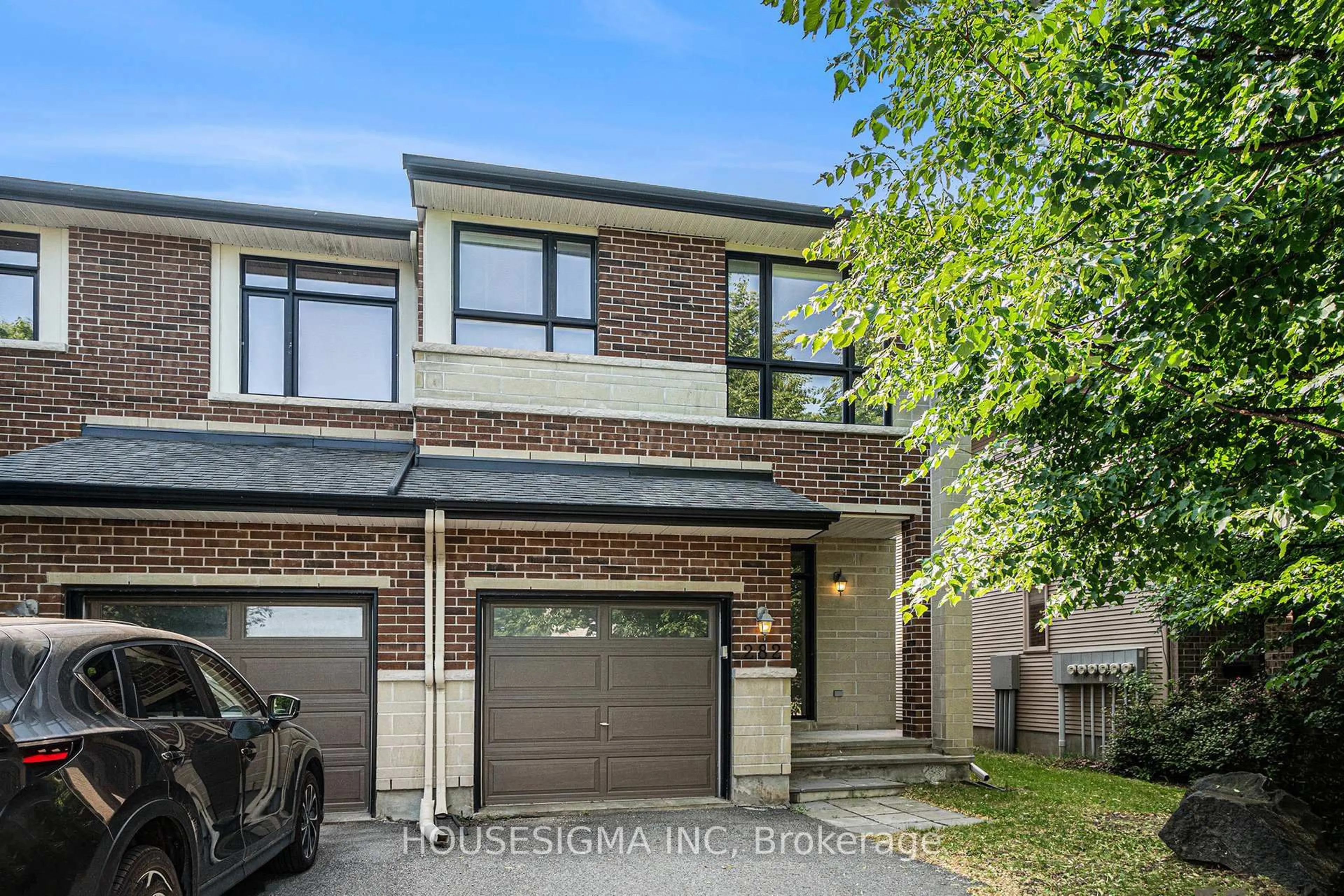 Home with brick exterior material, street for 282 Keyrock Dr, Kanata Ontario K2T 0G1