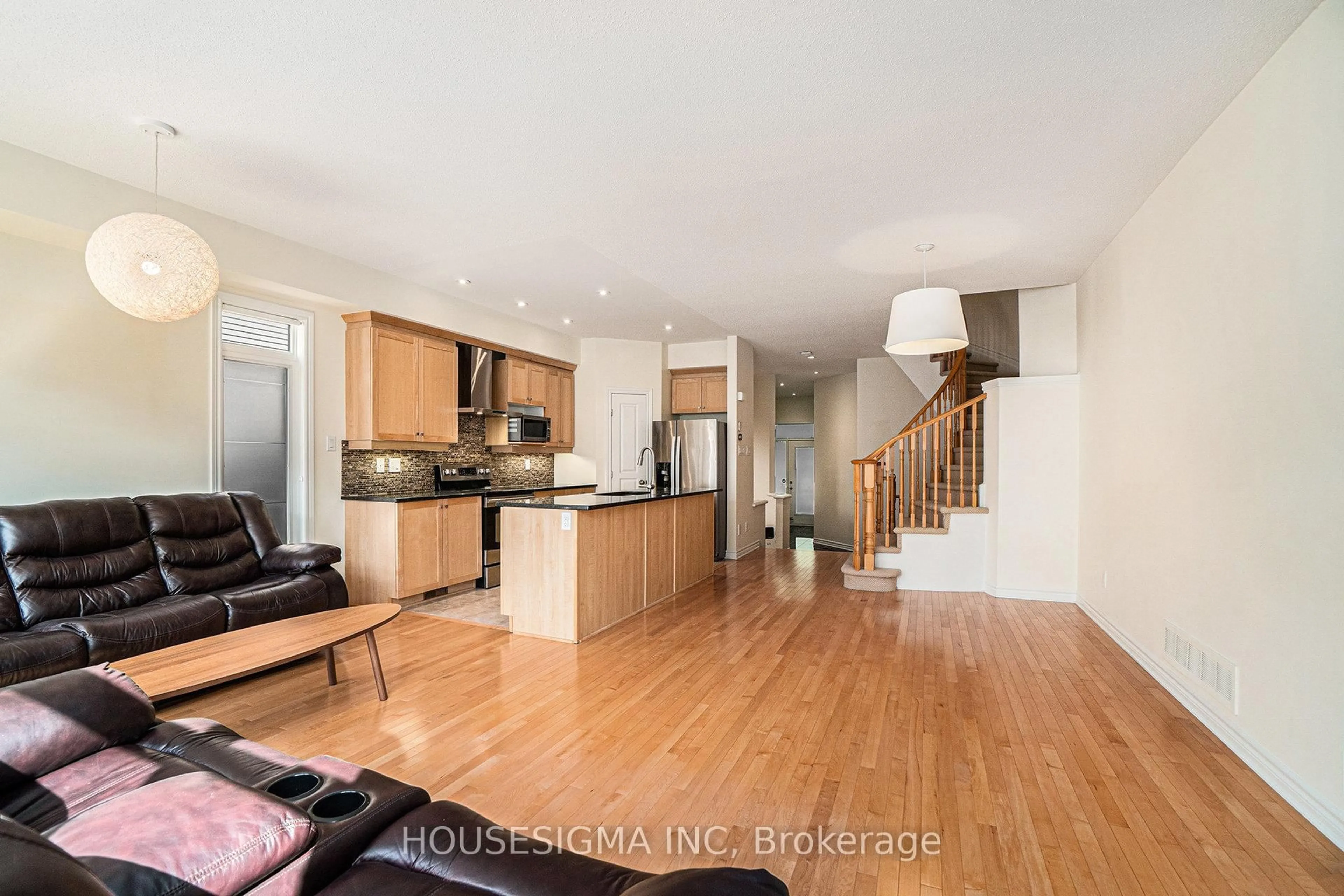 Open concept kitchen, wood/laminate floor for 282 Keyrock Dr, Kanata Ontario K2T 0G1