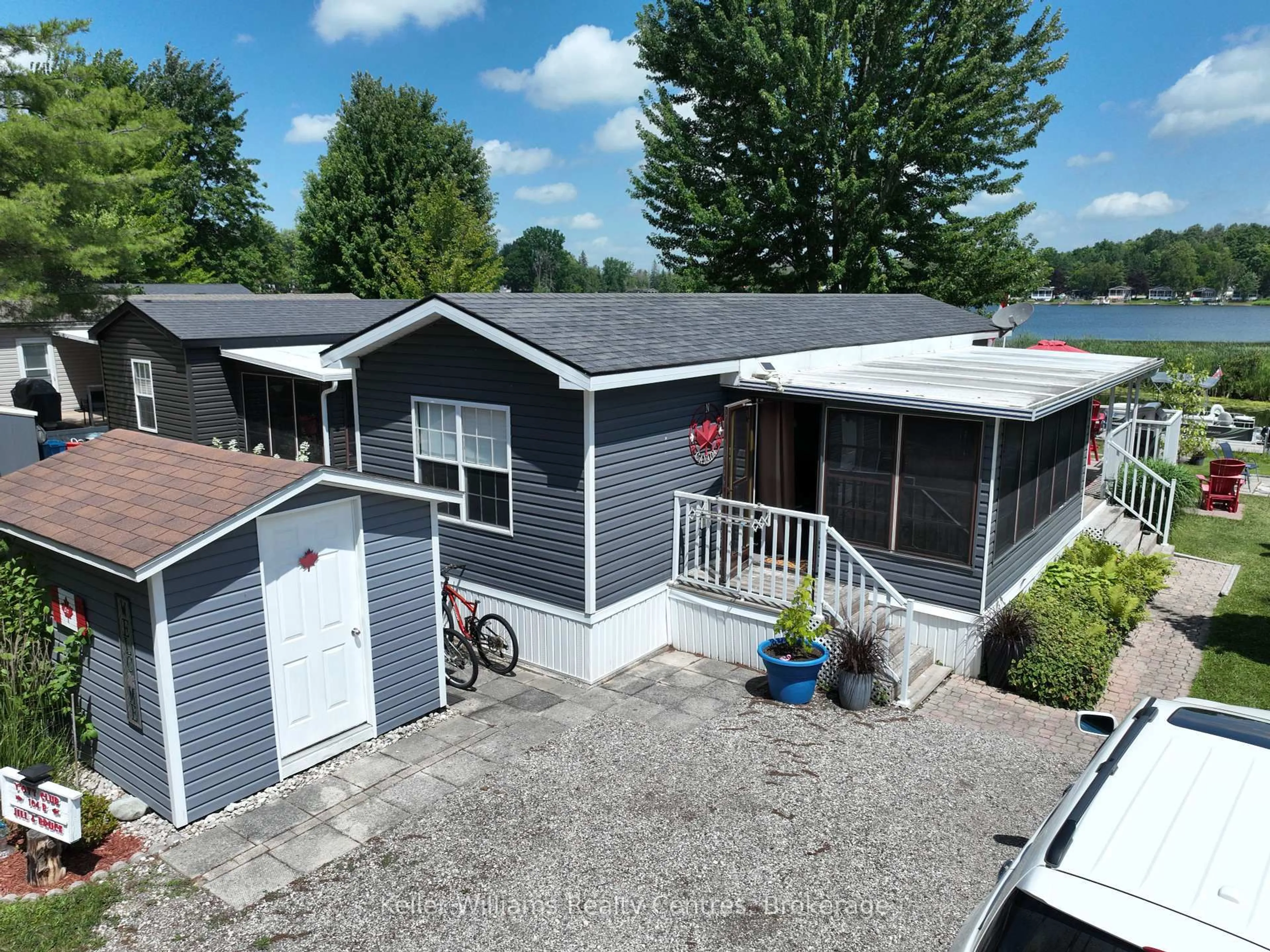 A pic from outside/outdoor area/front of a property/back of a property/a pic from drone, street for 13 Southline Ave #B104, Huron-Kinloss Ontario N0G 0E1