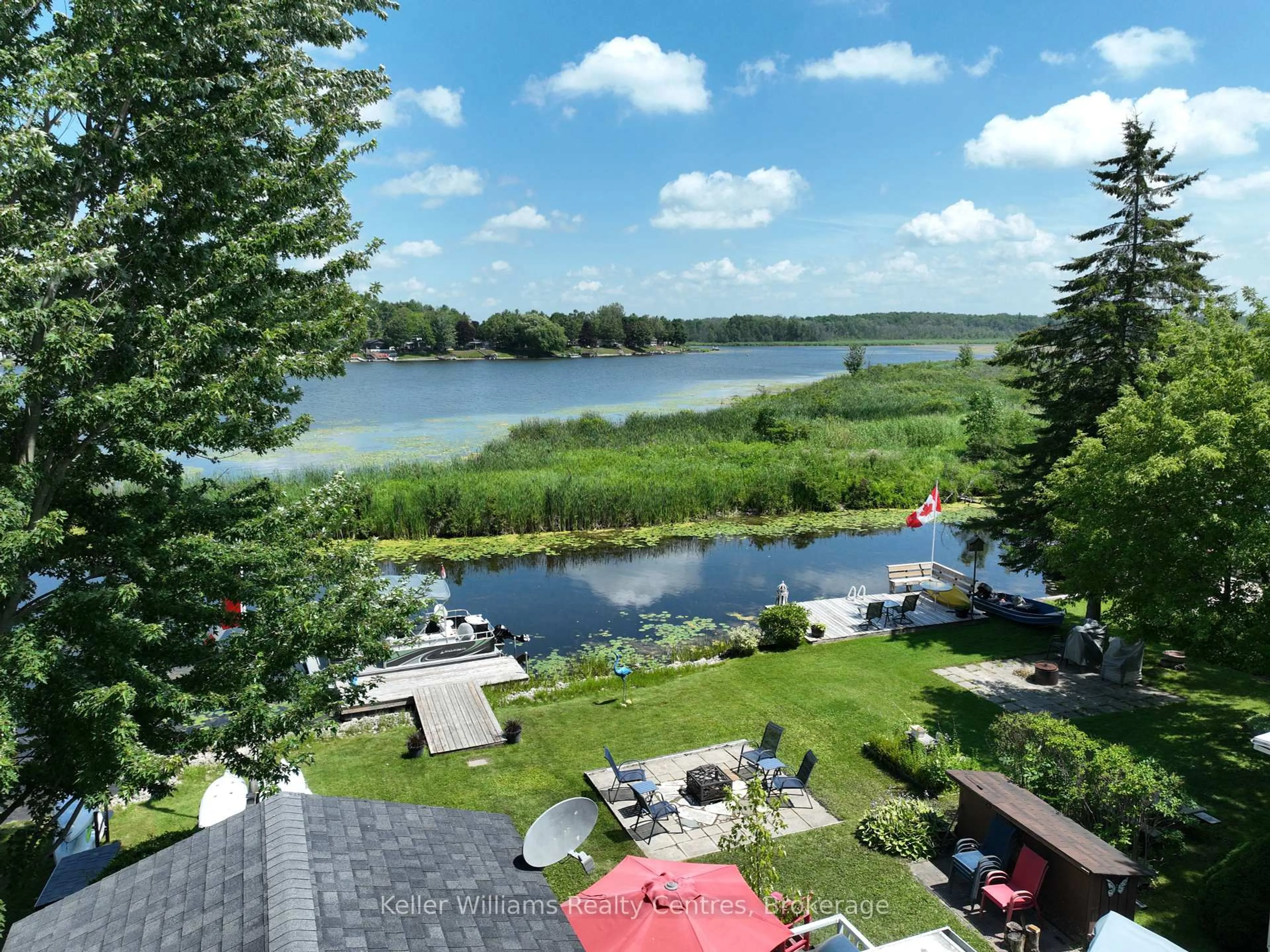 A pic from outside/outdoor area/front of a property/back of a property/a pic from drone, water/lake/river/ocean view for 13 Southline Ave #B104, Huron-Kinloss Ontario N0G 0E1