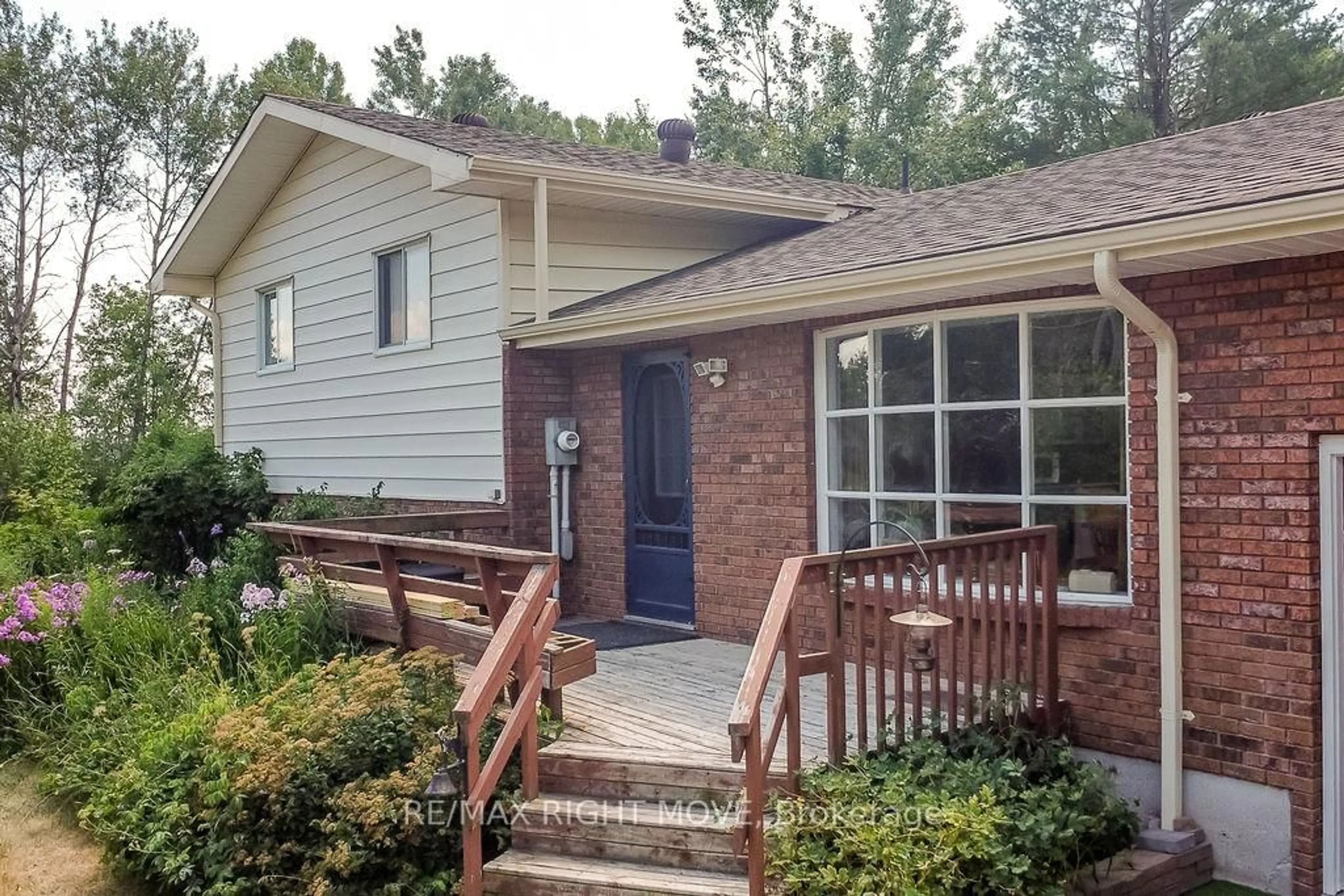 Home with brick exterior material, street for 20 HILLS Rd, Kawartha Lakes Ontario L0K 1W0