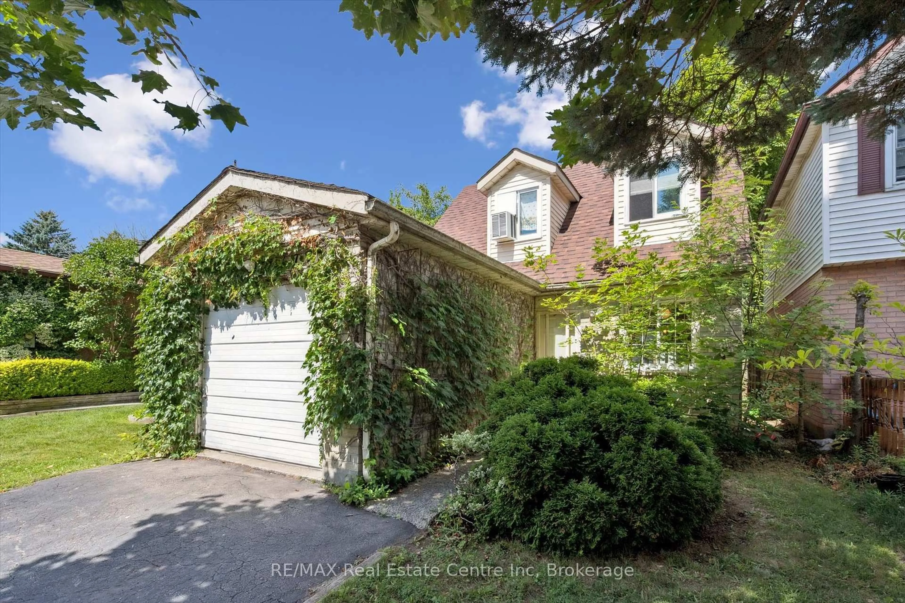 Home with brick exterior material, street for 177 Ironwood Rd, Guelph Ontario N1G 3P5
