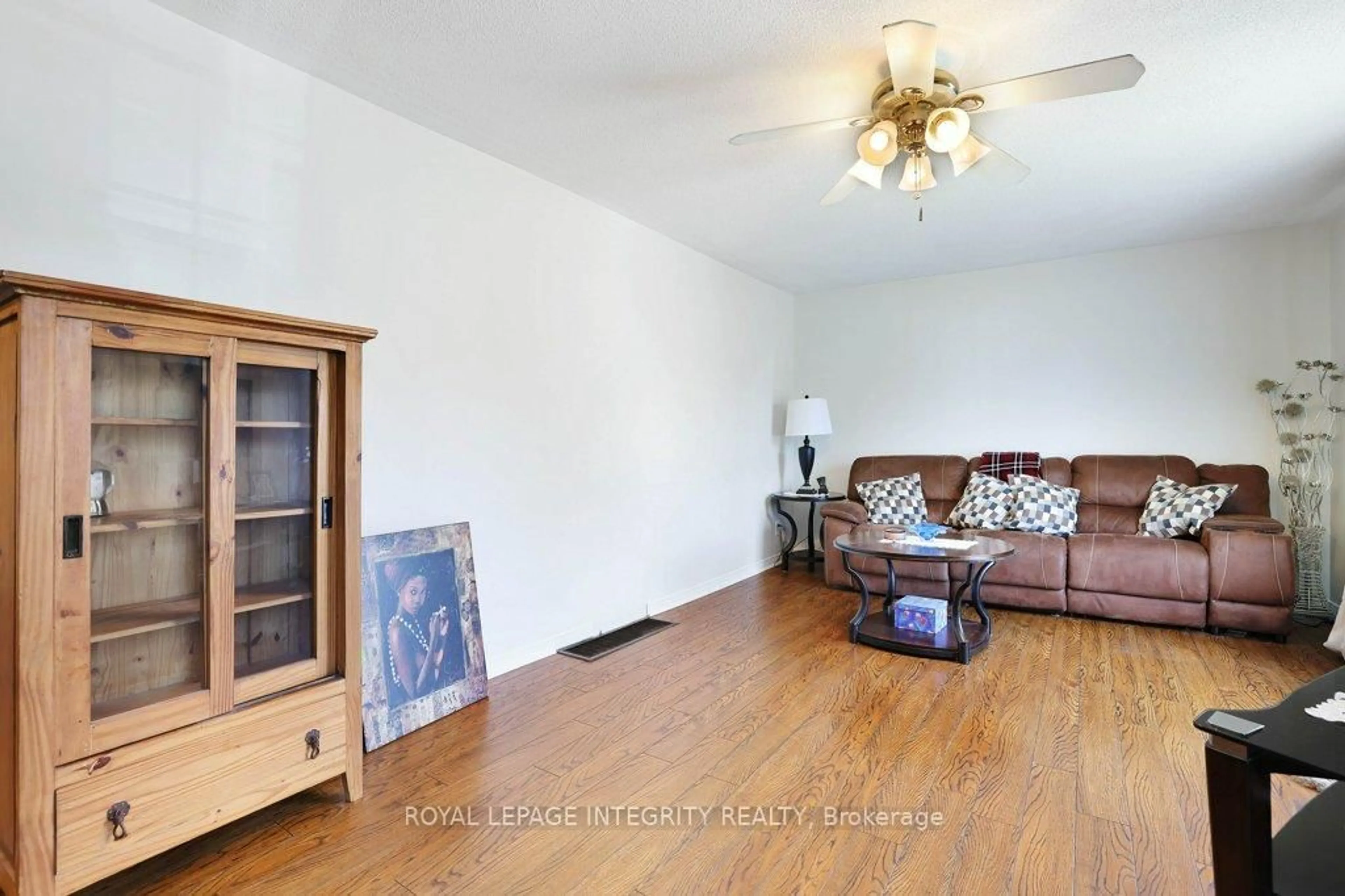 Living room with furniture, wood/laminate floor for 45 Alston St, White Lake Ontario K0A 3L0