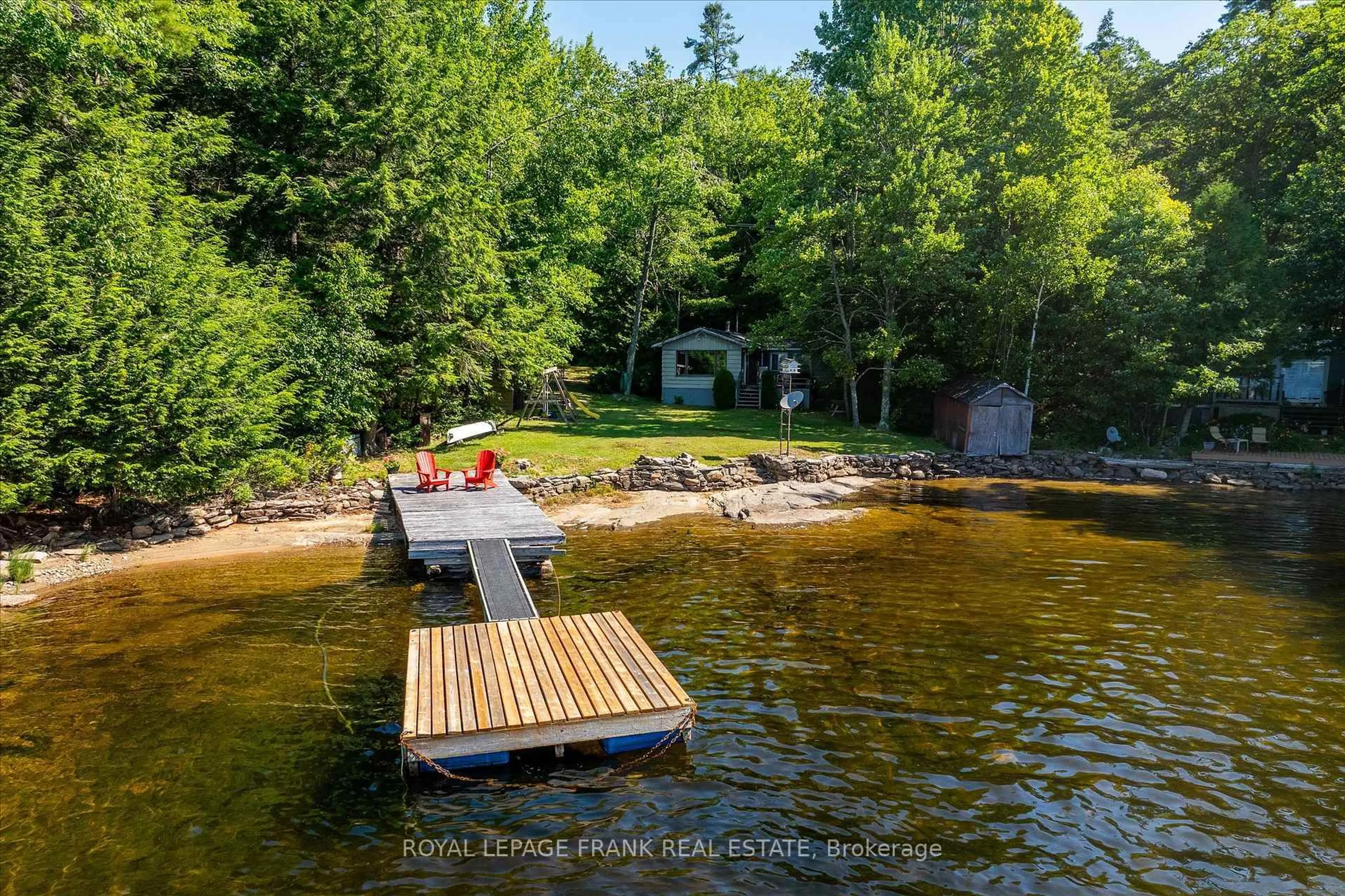 A pic from outside/outdoor area/front of a property/back of a property/a pic from drone, water/lake/river/ocean view for 8 Fire Route 246A, Trent Lakes Ontario K0L 1J0