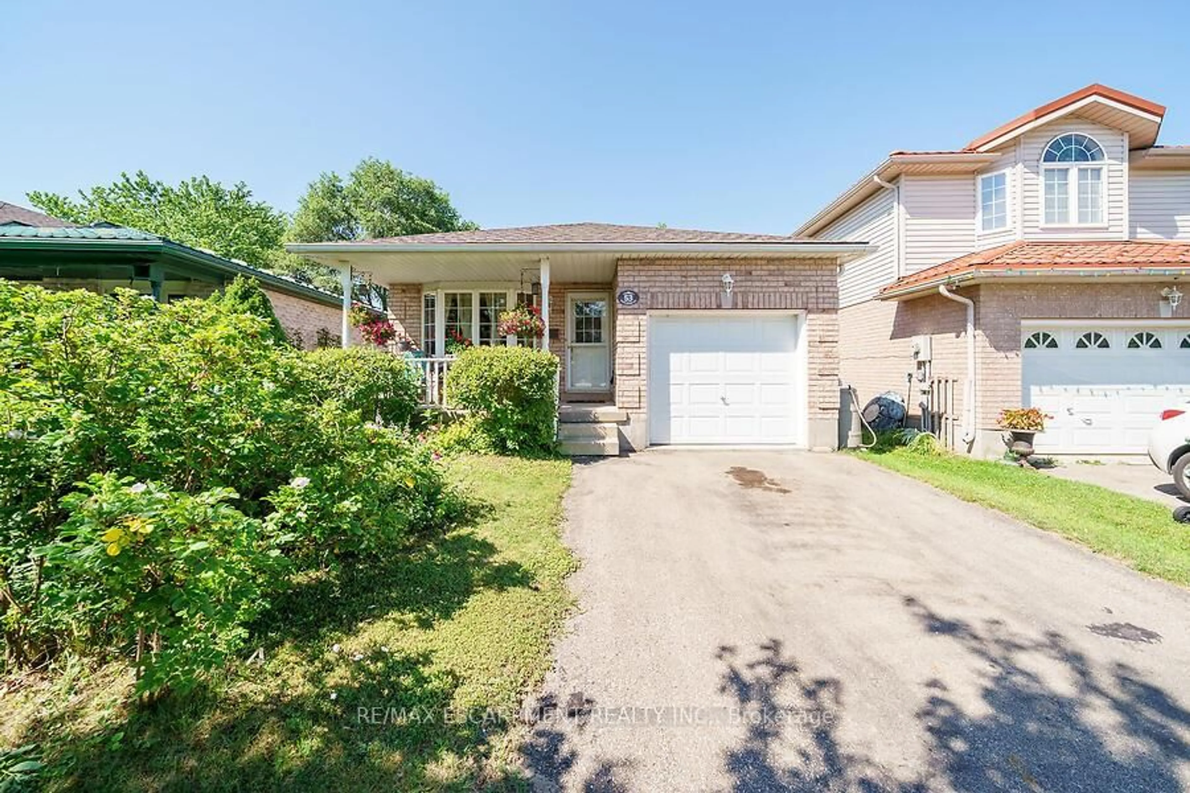 Home with brick exterior material, street for 53 Castlebury Dr, Guelph Ontario N1K 1X2