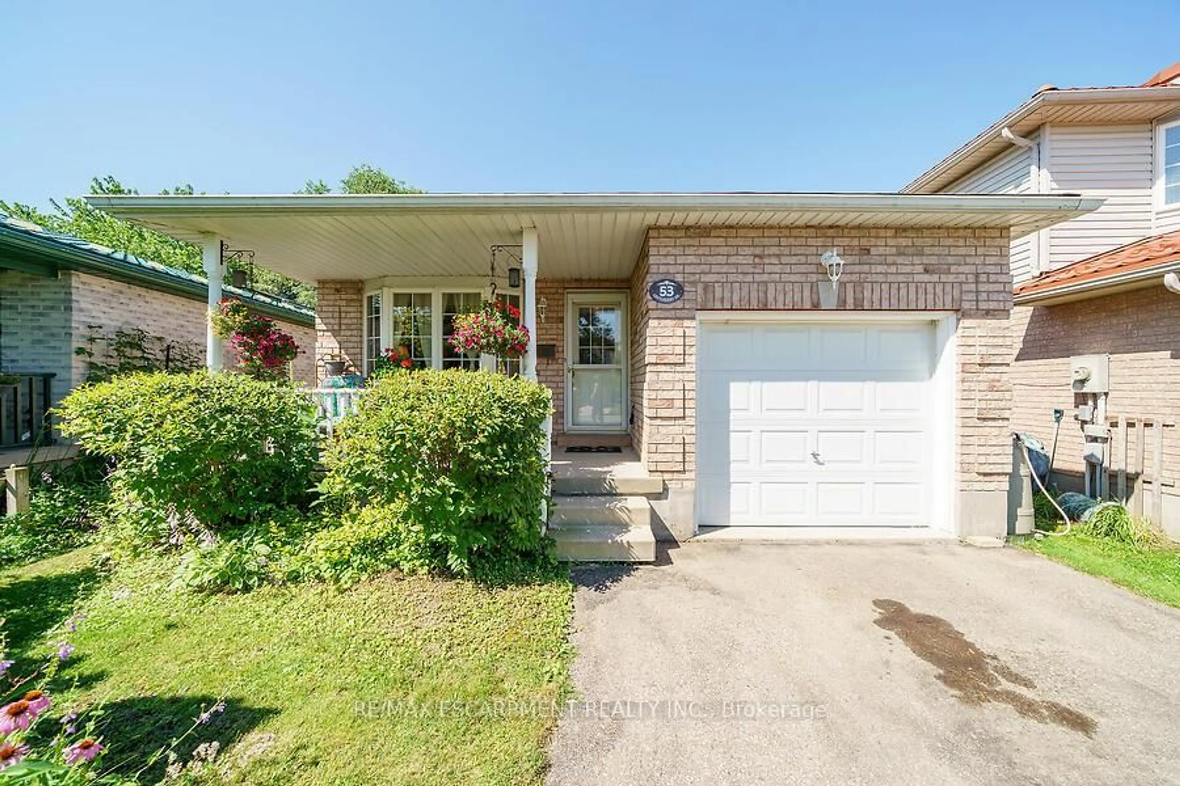 Home with brick exterior material, street for 53 Castlebury Dr, Guelph Ontario N1K 1X2