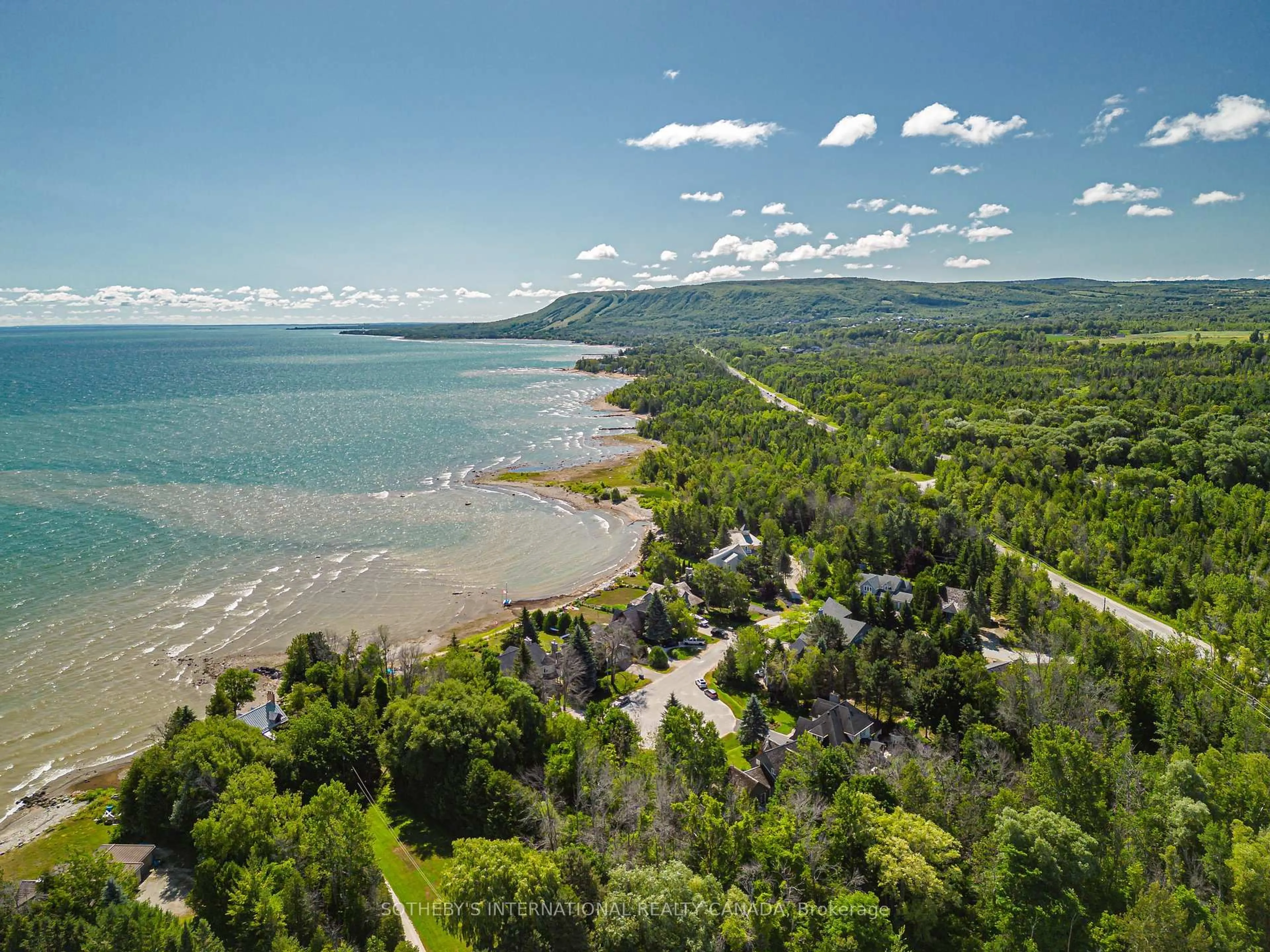 A pic from outside/outdoor area/front of a property/back of a property/a pic from drone, water/lake/river/ocean view for 121 Fieldcrest Crt, Blue Mountains Ontario N0H 1J0