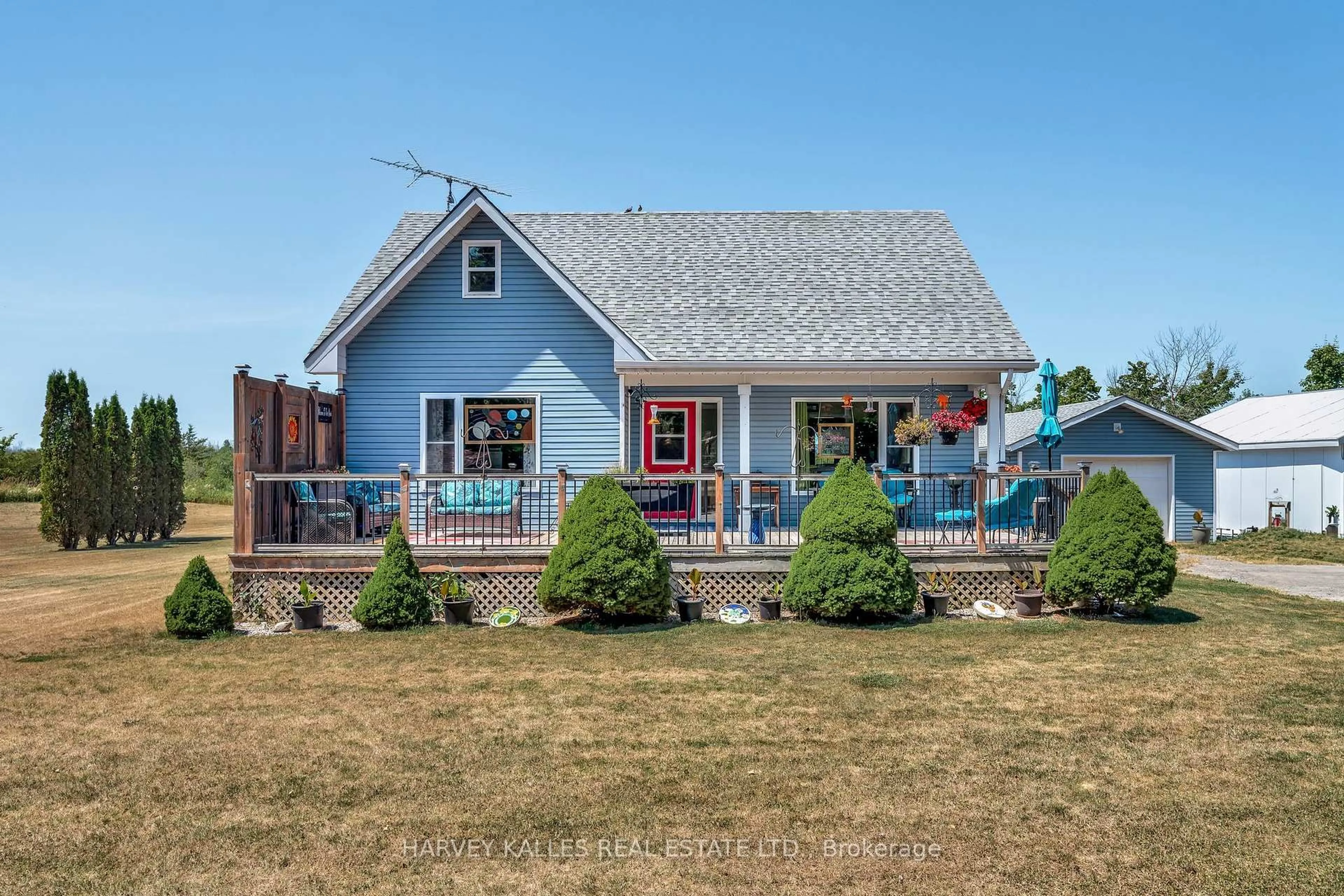 Home with vinyl exterior material, street for 168 Schoolhouse Rd, Prince Edward County Ontario K0K 2P0