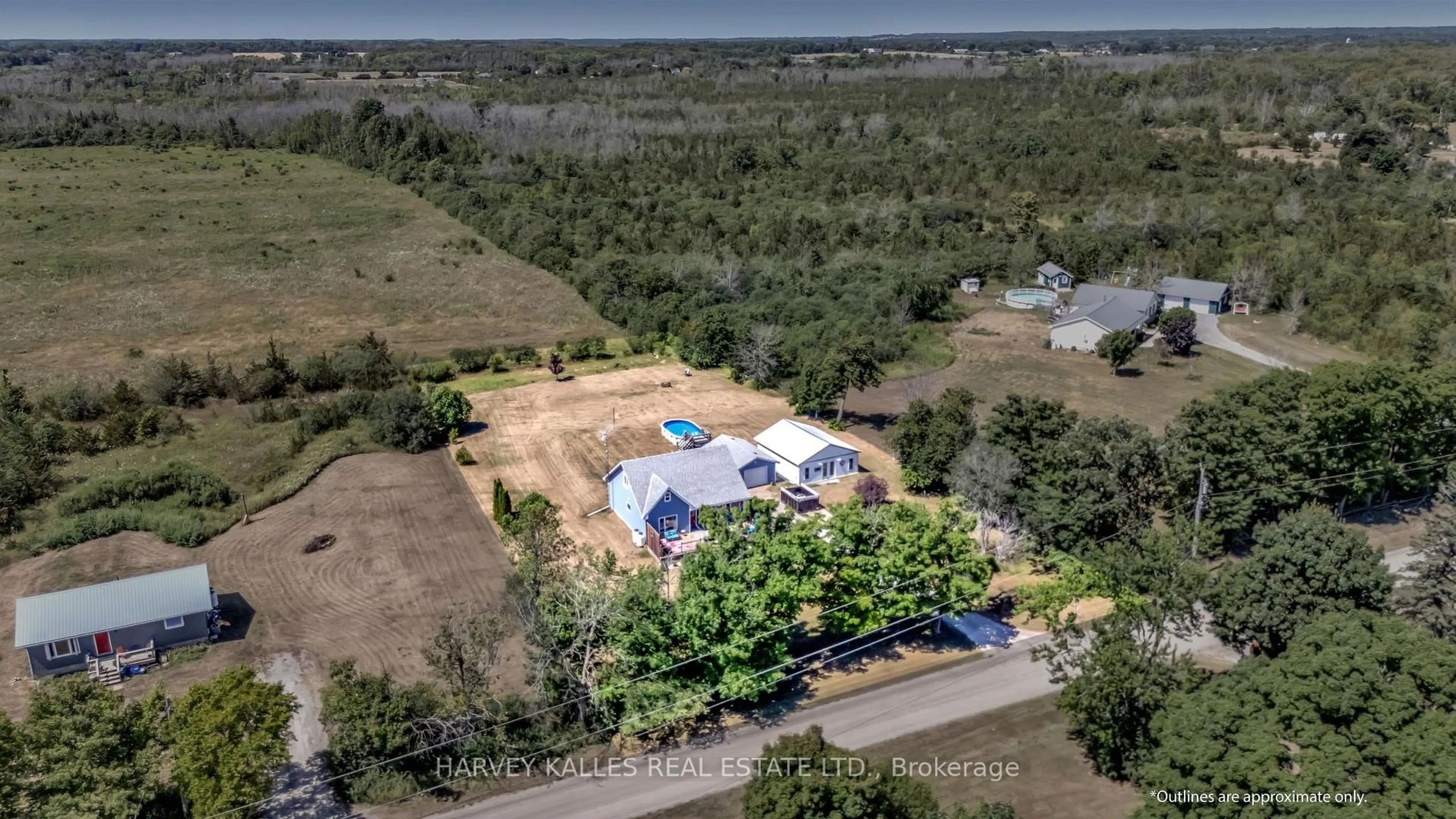 A pic from outside/outdoor area/front of a property/back of a property/a pic from drone, water/lake/river/ocean view for 168 Schoolhouse Rd, Prince Edward County Ontario K0K 2P0