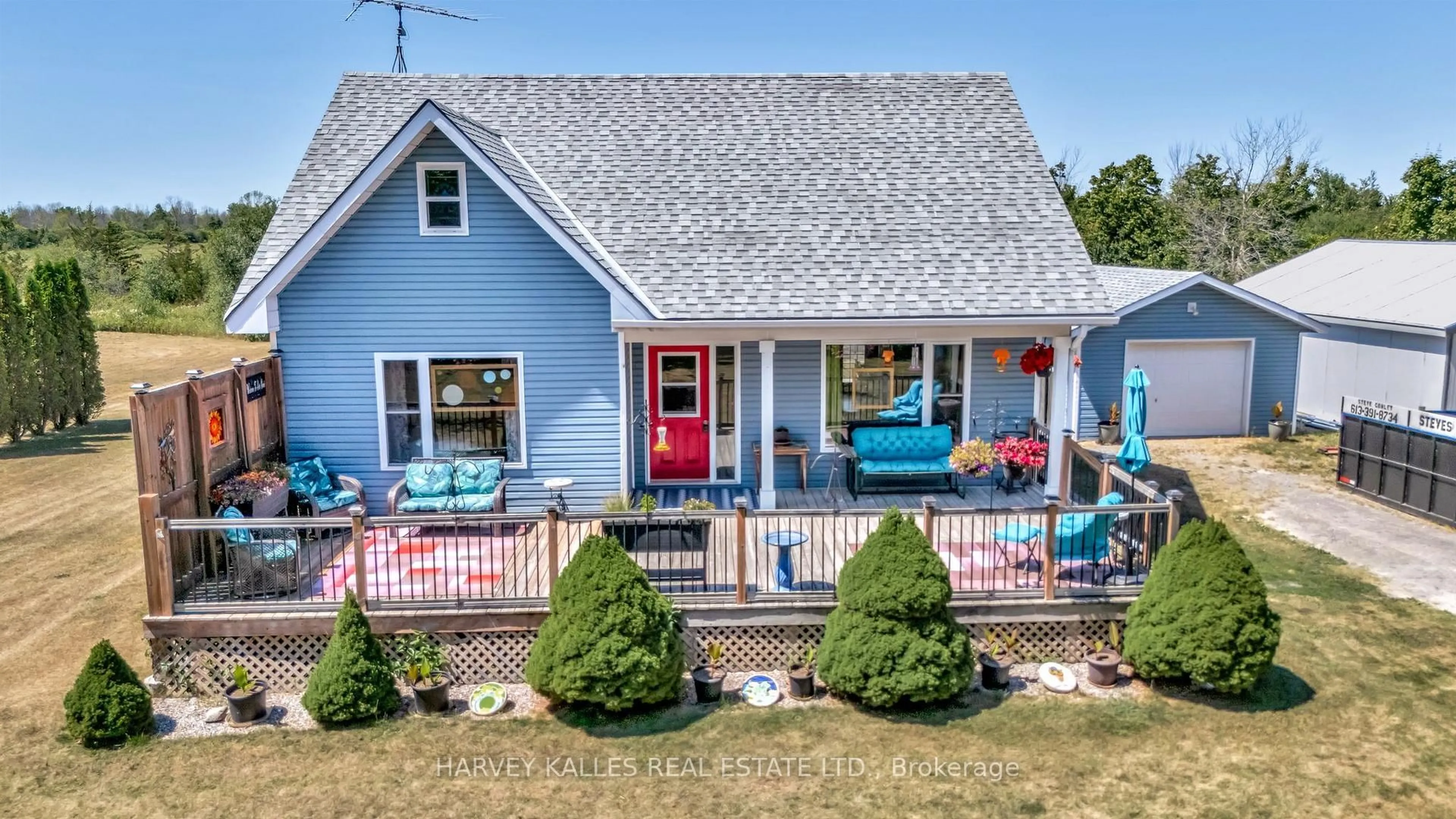 Home with vinyl exterior material, street for 168 Schoolhouse Rd, Prince Edward County Ontario K0K 2P0