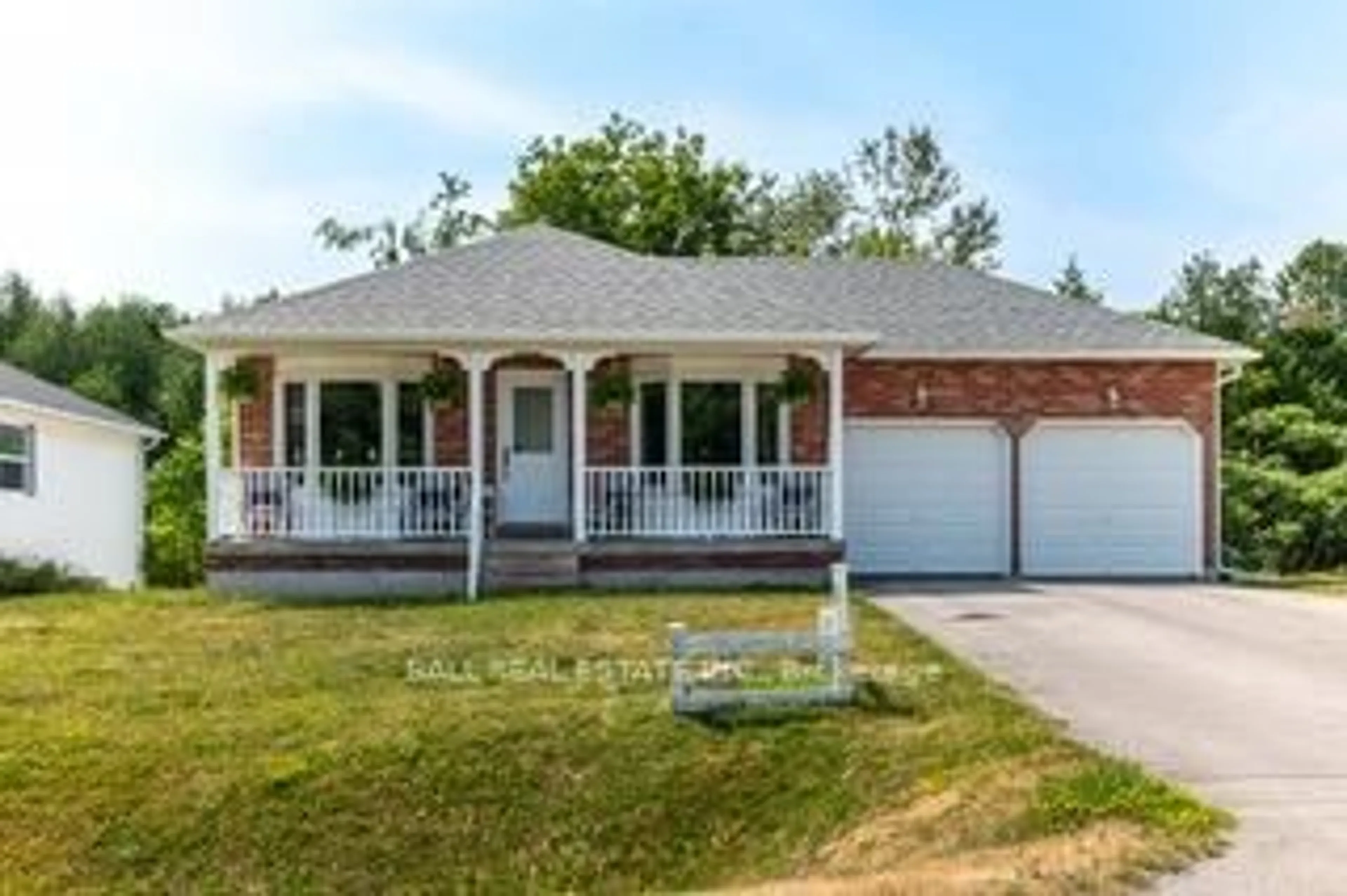 Home with brick exterior material, street for 32 Champlain Blvd, Kawartha Lakes Ontario K9V 4R1