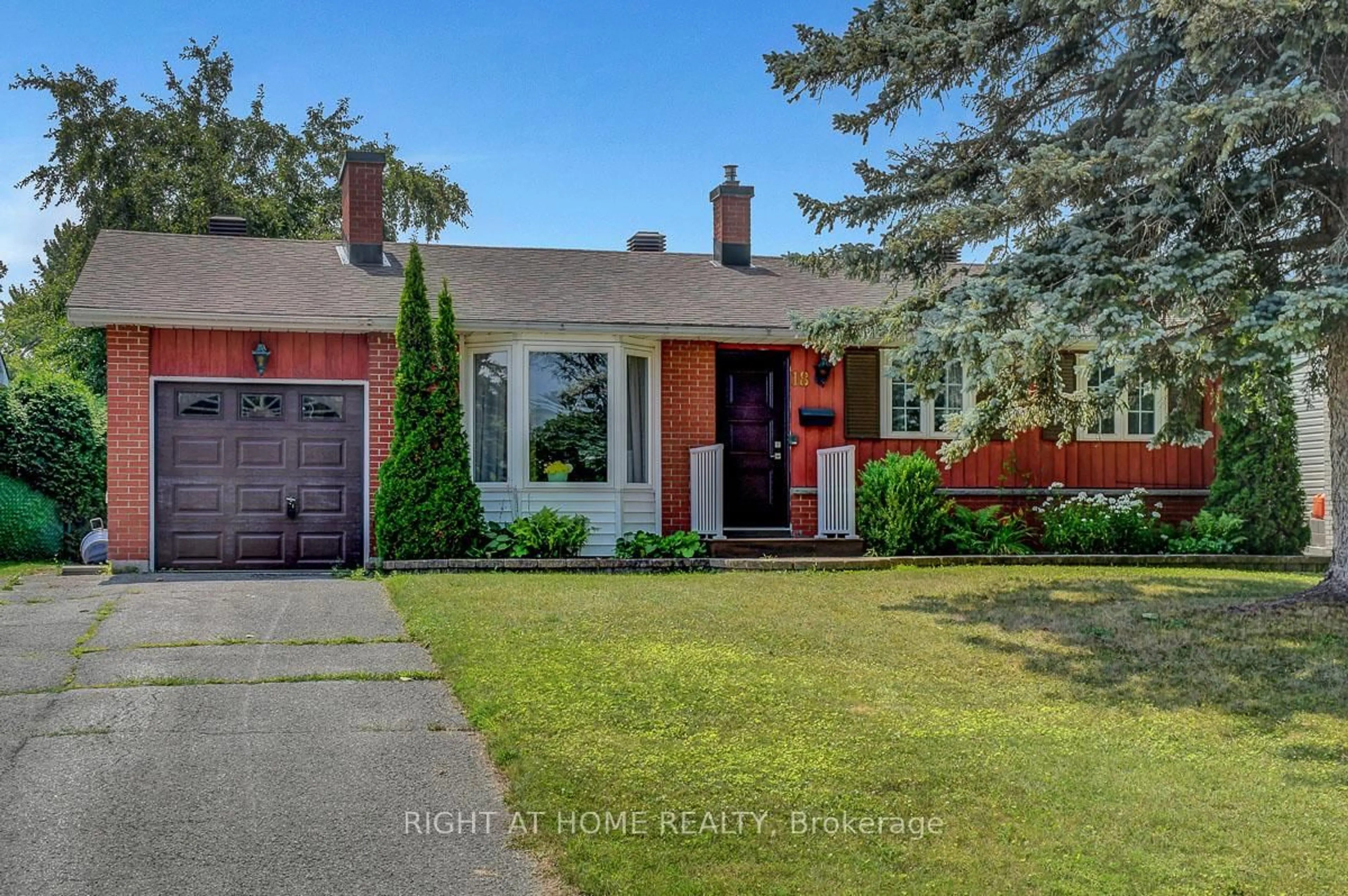 Home with brick exterior material, street for 18 Courtney Rd, Ottawa Ontario K2L 1L8