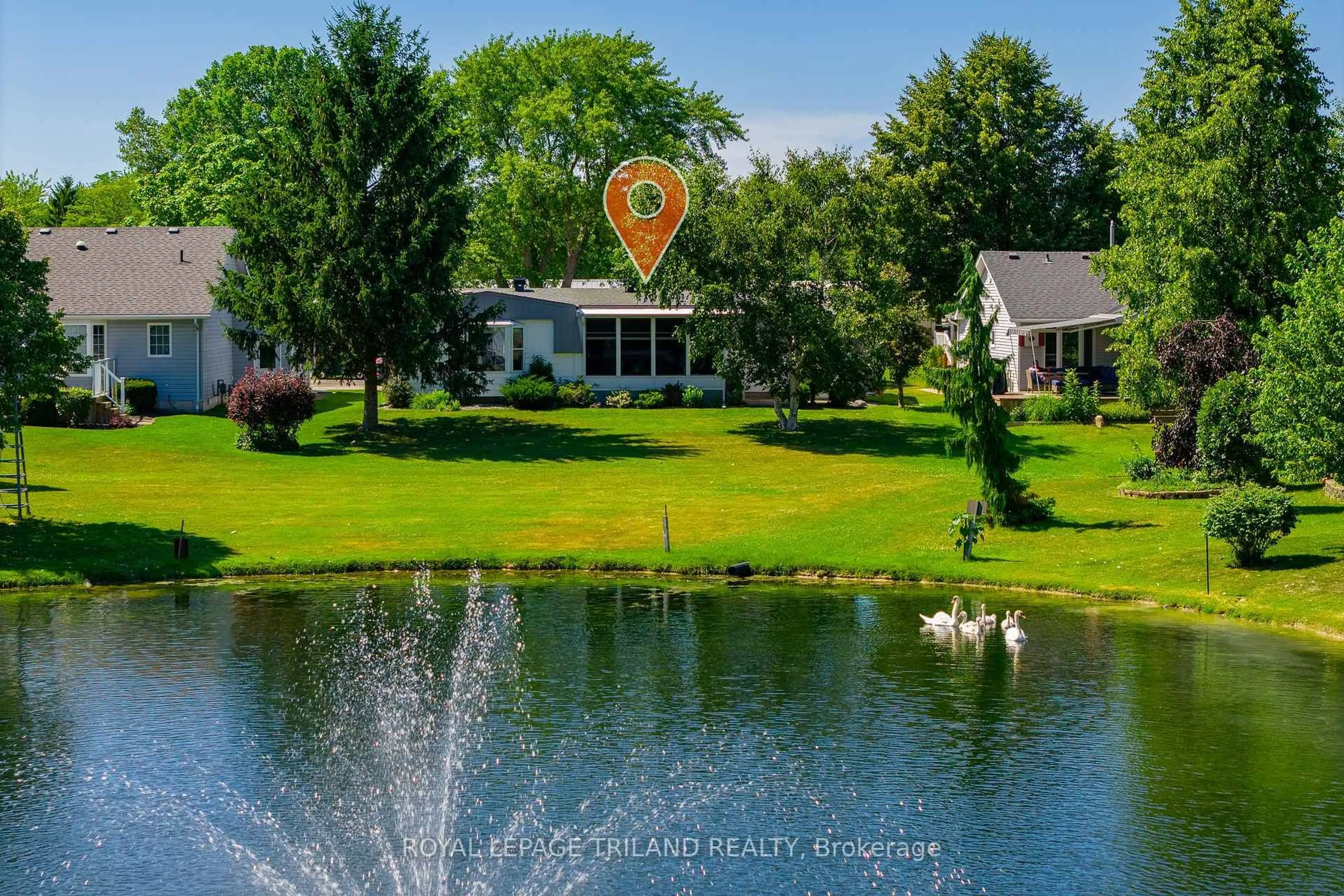A pic from outside/outdoor area/front of a property/back of a property/a pic from drone, water/lake/river/ocean view for 387 Augusta Cres, South Huron Ontario N0M 1T0