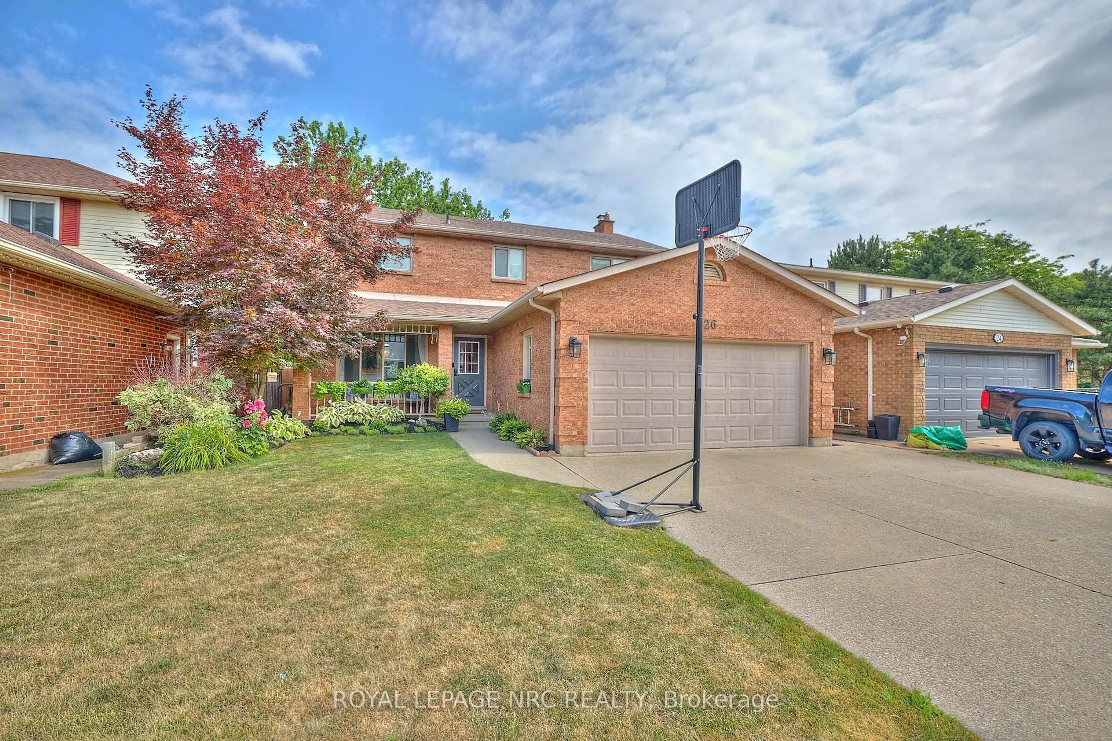 Home with brick exterior material, street for 26 Elderwood Dr, St. Catharines Ontario L2S 3E5