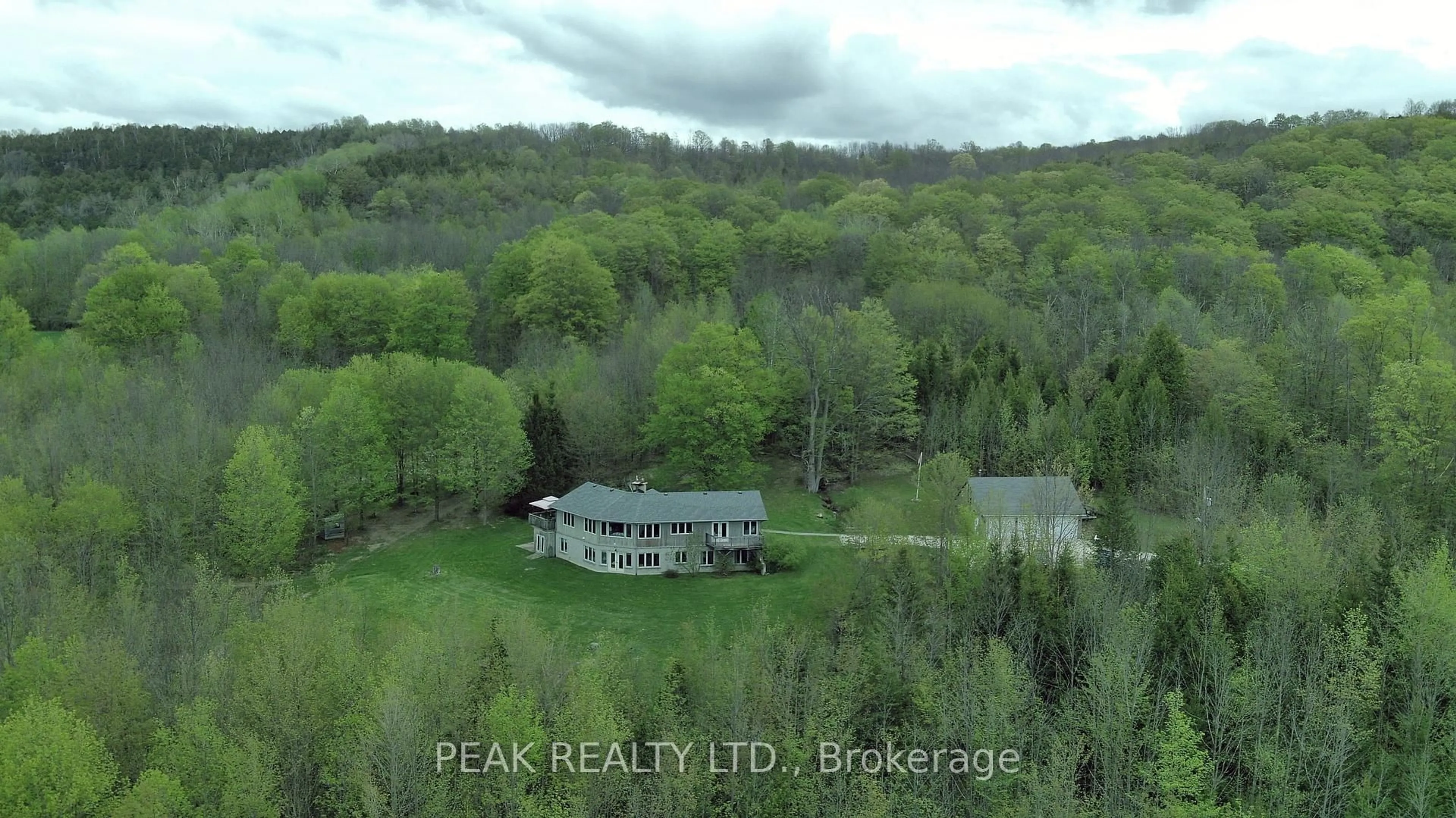 A pic from outside/outdoor area/front of a property/back of a property/a pic from drone, forest/trees view for 546299 Sideroad 4B Rd, Grey Highlands Ontario N0C 1G0