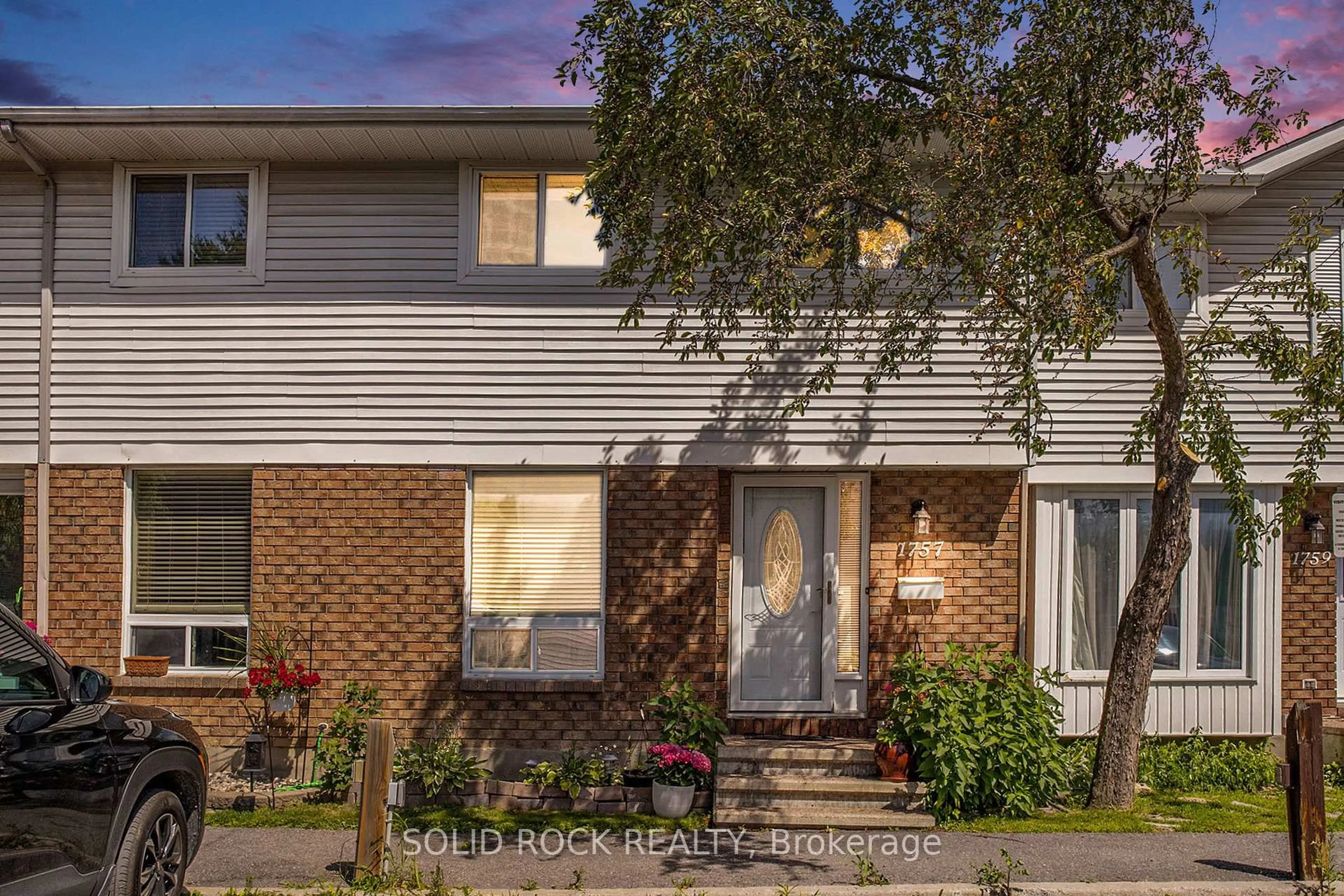Home with brick exterior material, street for 1757 Winter Rose Lane, Ottawa Ontario K1C 7A2