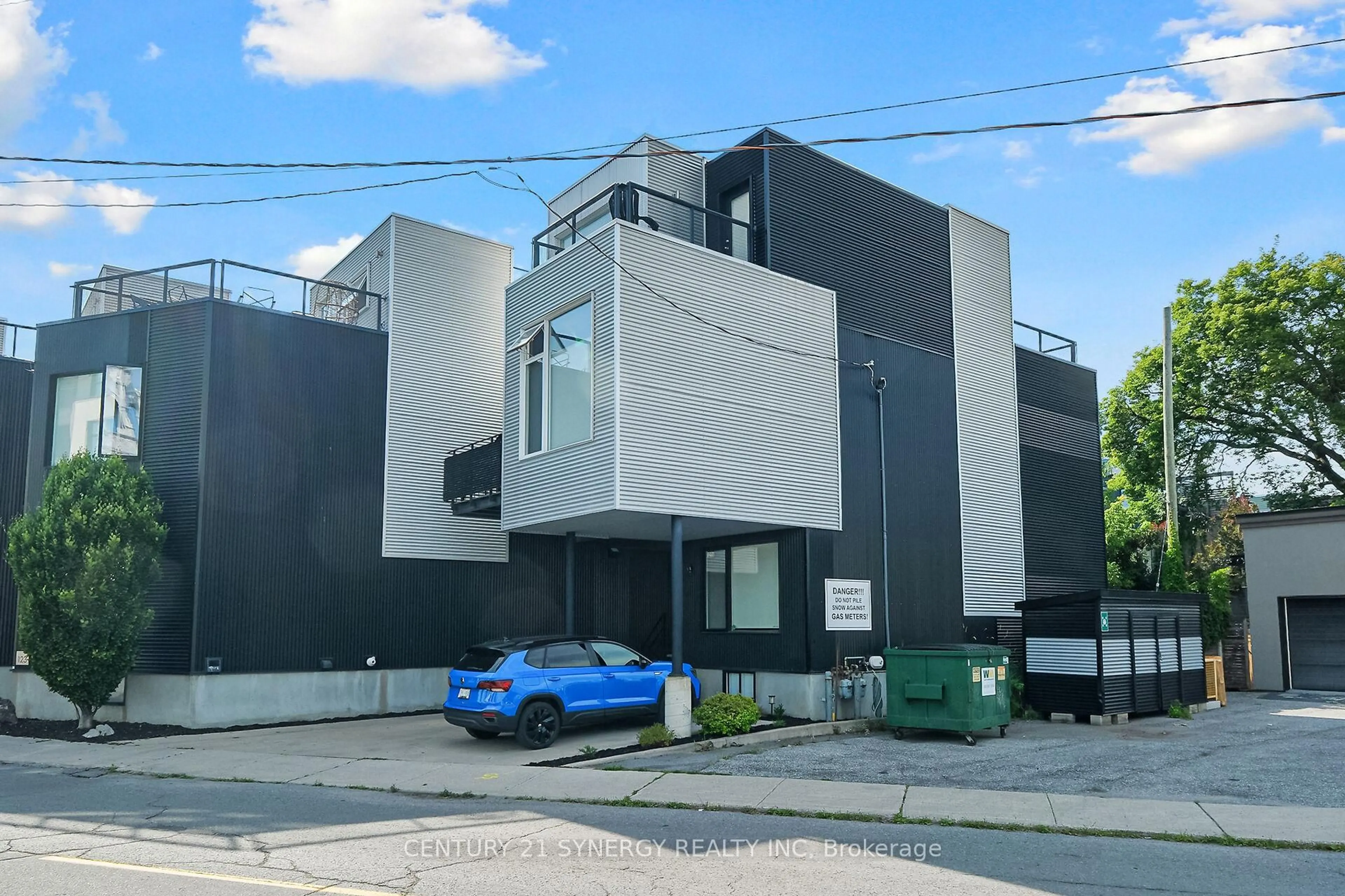 A pic from outside/outdoor area/front of a property/back of a property/a pic from drone, street for 121 Armstrong Ave #B, Ottawa Ontario K1Y 2V8