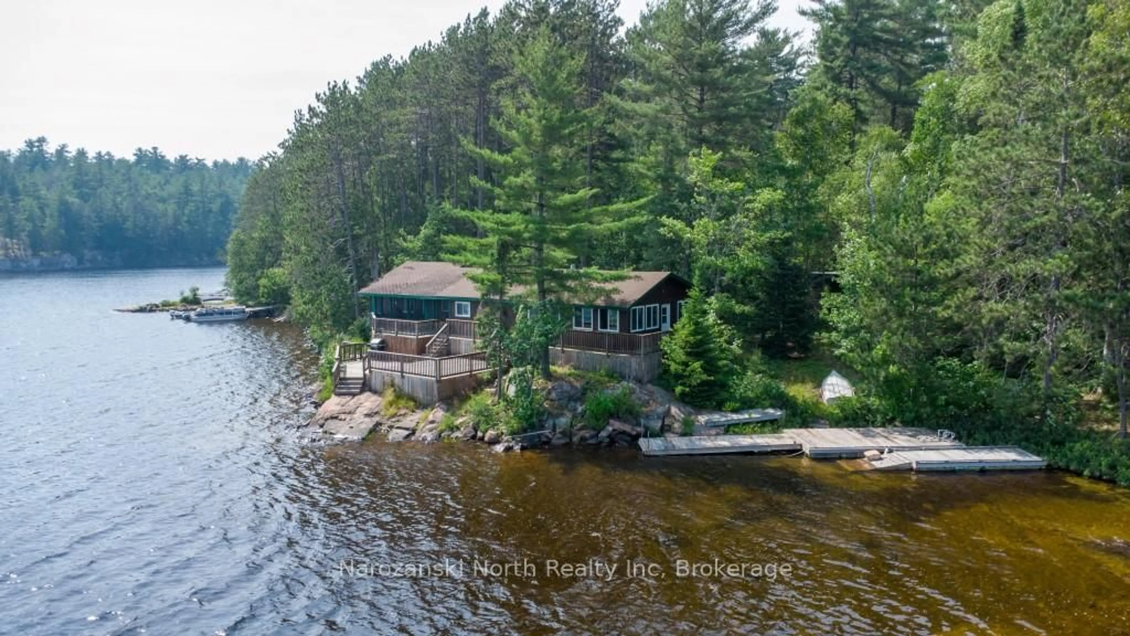 A pic from outside/outdoor area/front of a property/back of a property/a pic from drone, water/lake/river/ocean view for 99 B Zettler Bay Rd, French River Ontario P0M 2N0
