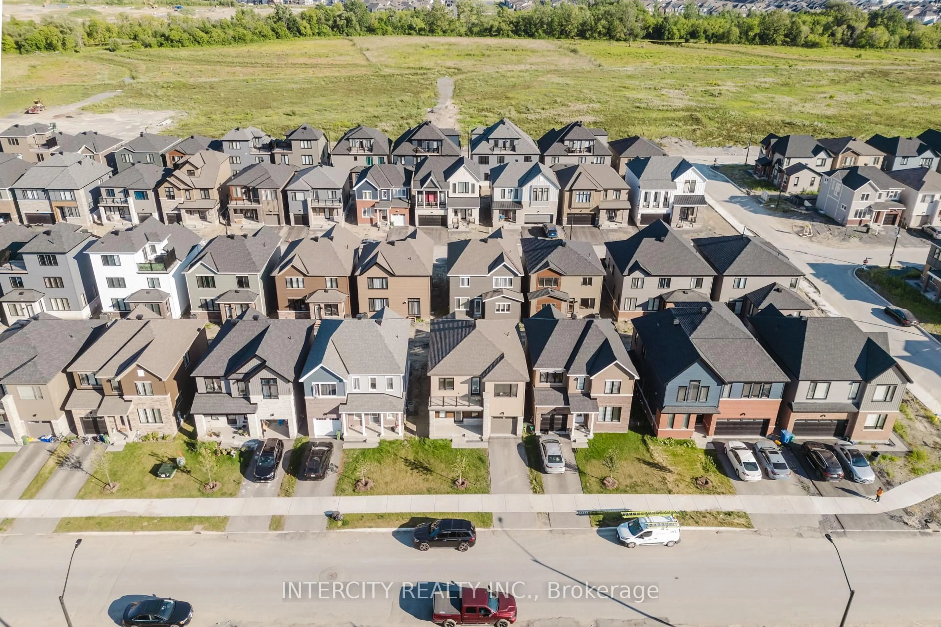 A pic from outside/outdoor area/front of a property/back of a property/a pic from drone, street for 187 Conservancy Dr, Ottawa Ontario K2J 0K6