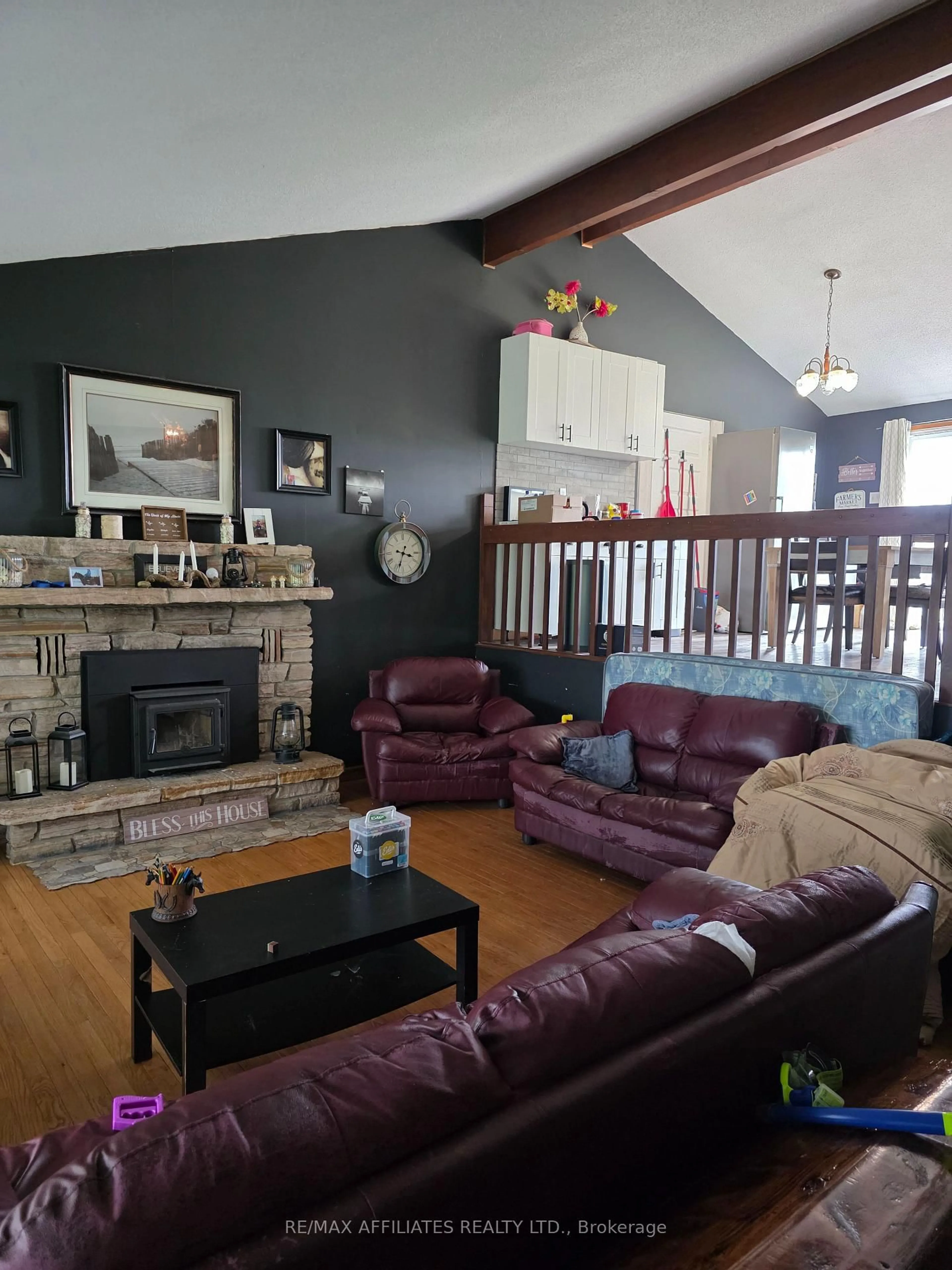 Living room with furniture, wood/laminate floor for 712 Daytown Rd, Rideau Lakes Ontario K0E 1G0