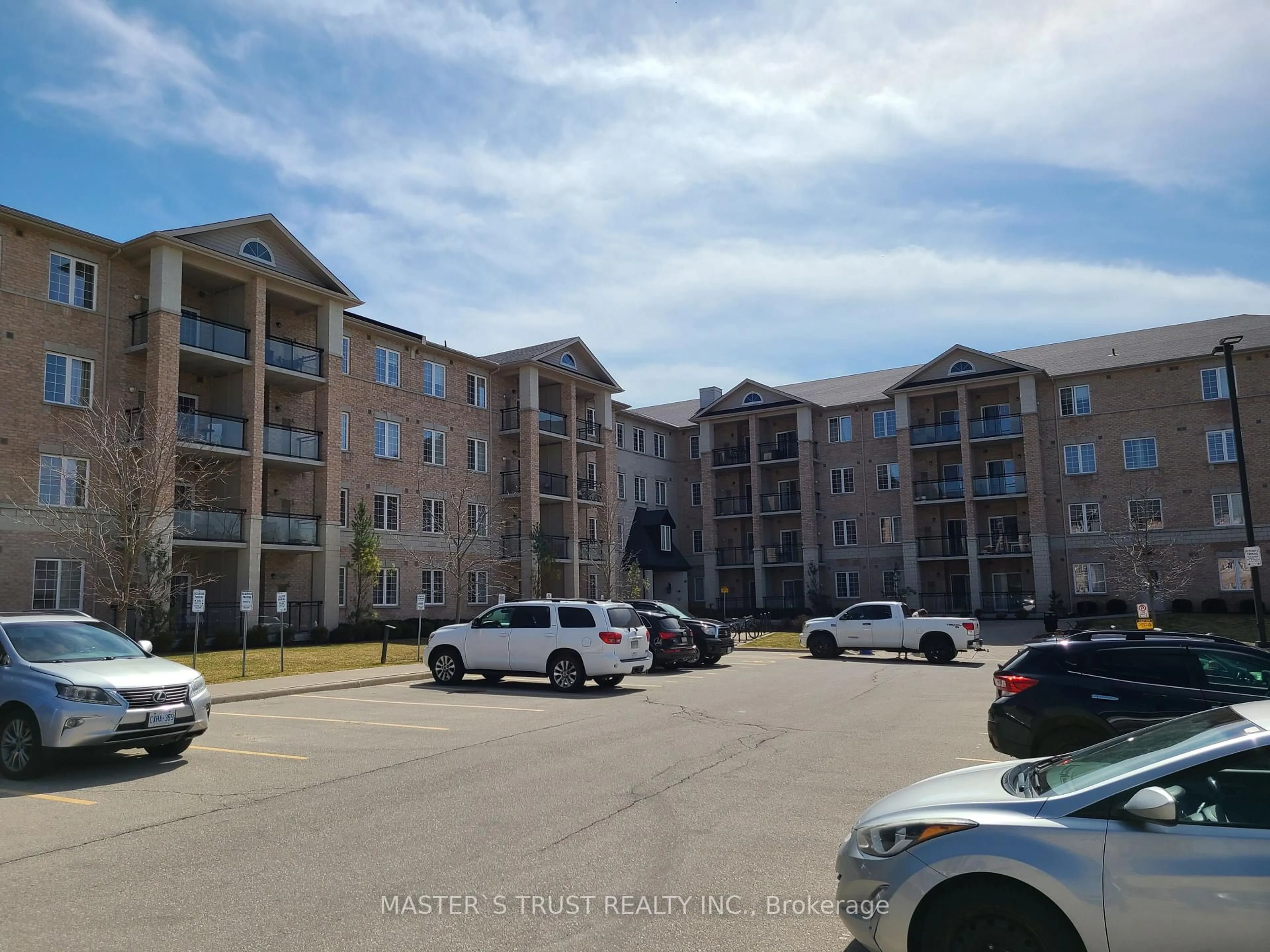 A pic from outside/outdoor area/front of a property/back of a property/a pic from drone, unknown for 1077 Gordon St #323, Guelph Ontario N1G 0E3