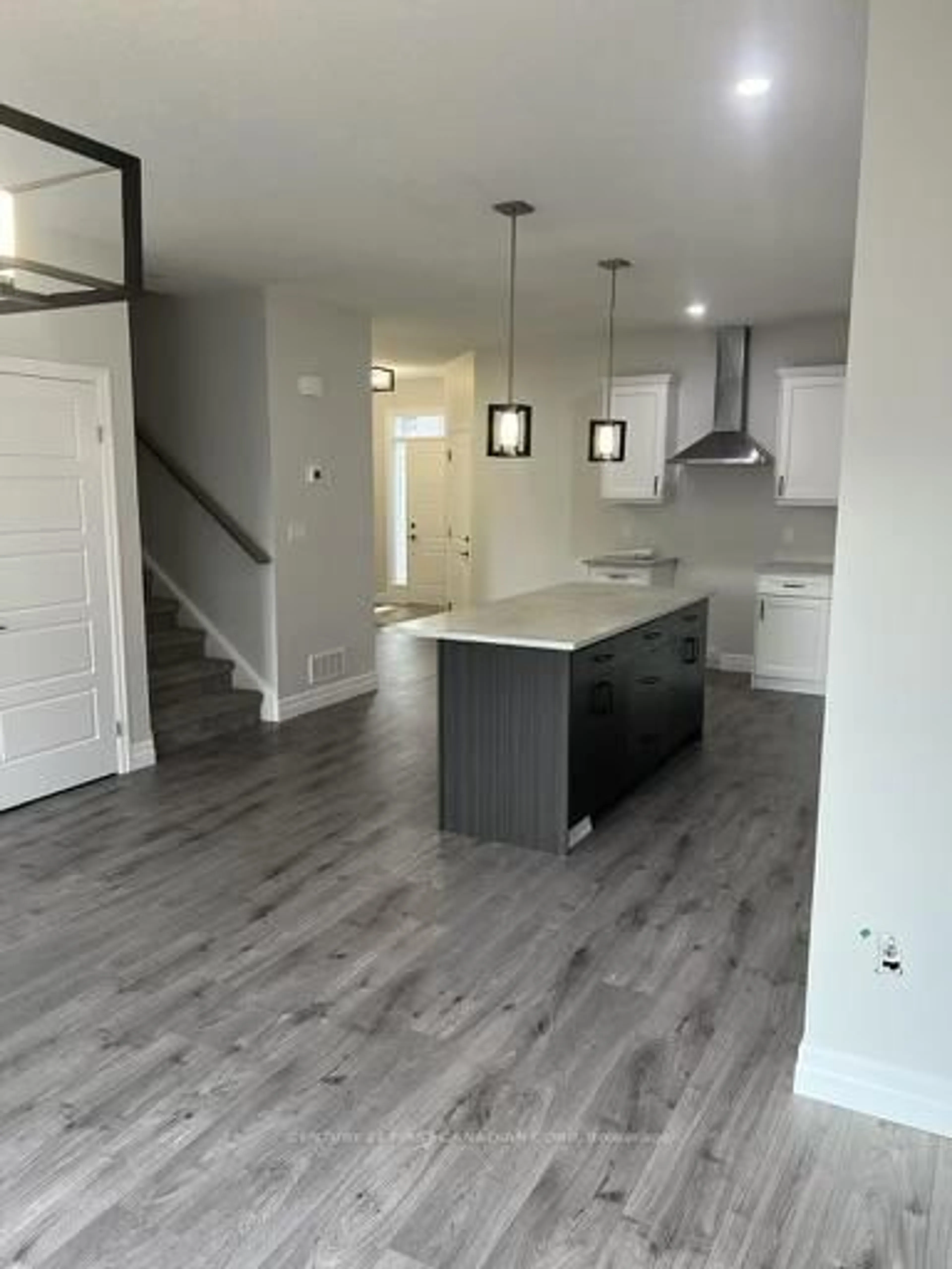 Open concept kitchen, wood/laminate floor for 113 Marconi Crt, London East Ontario N5V 0C9