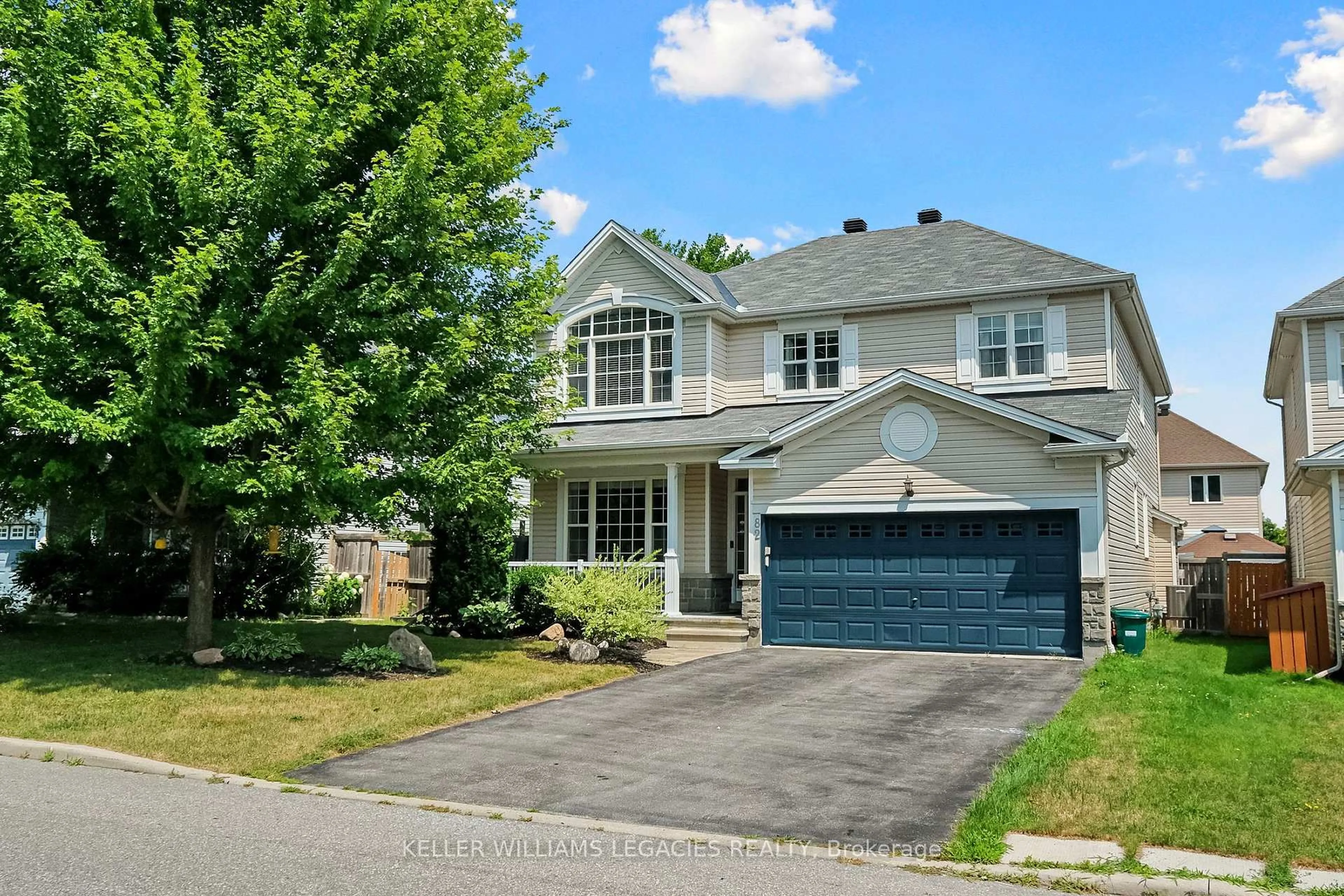 Home with vinyl exterior material, street for 82 Monterossa St, Ottawa Ontario K2S 2H5