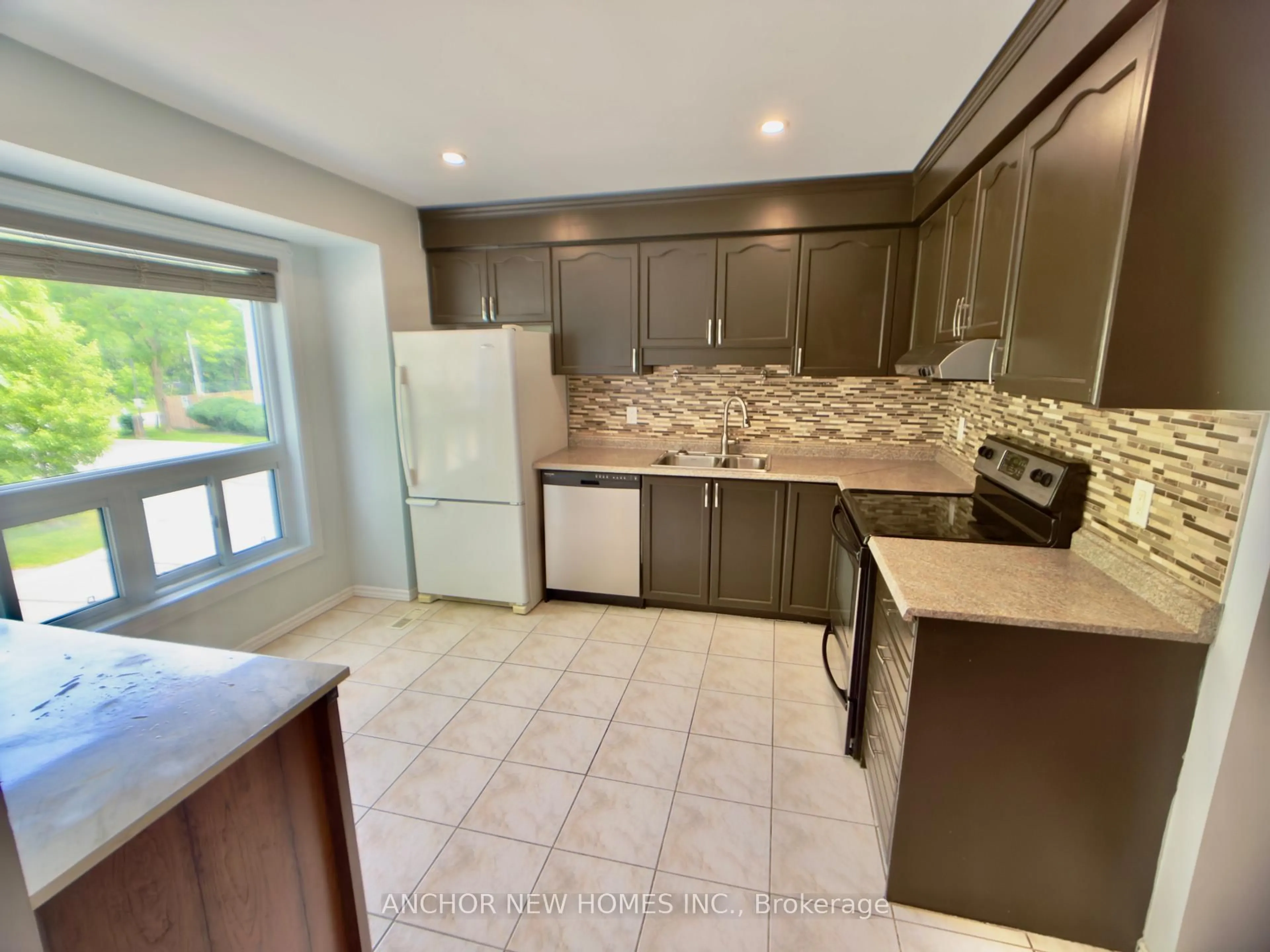 Open concept kitchen, ceramic/tile floor for 1990 WAVELL St #72, London East Ontario N5V 4N5