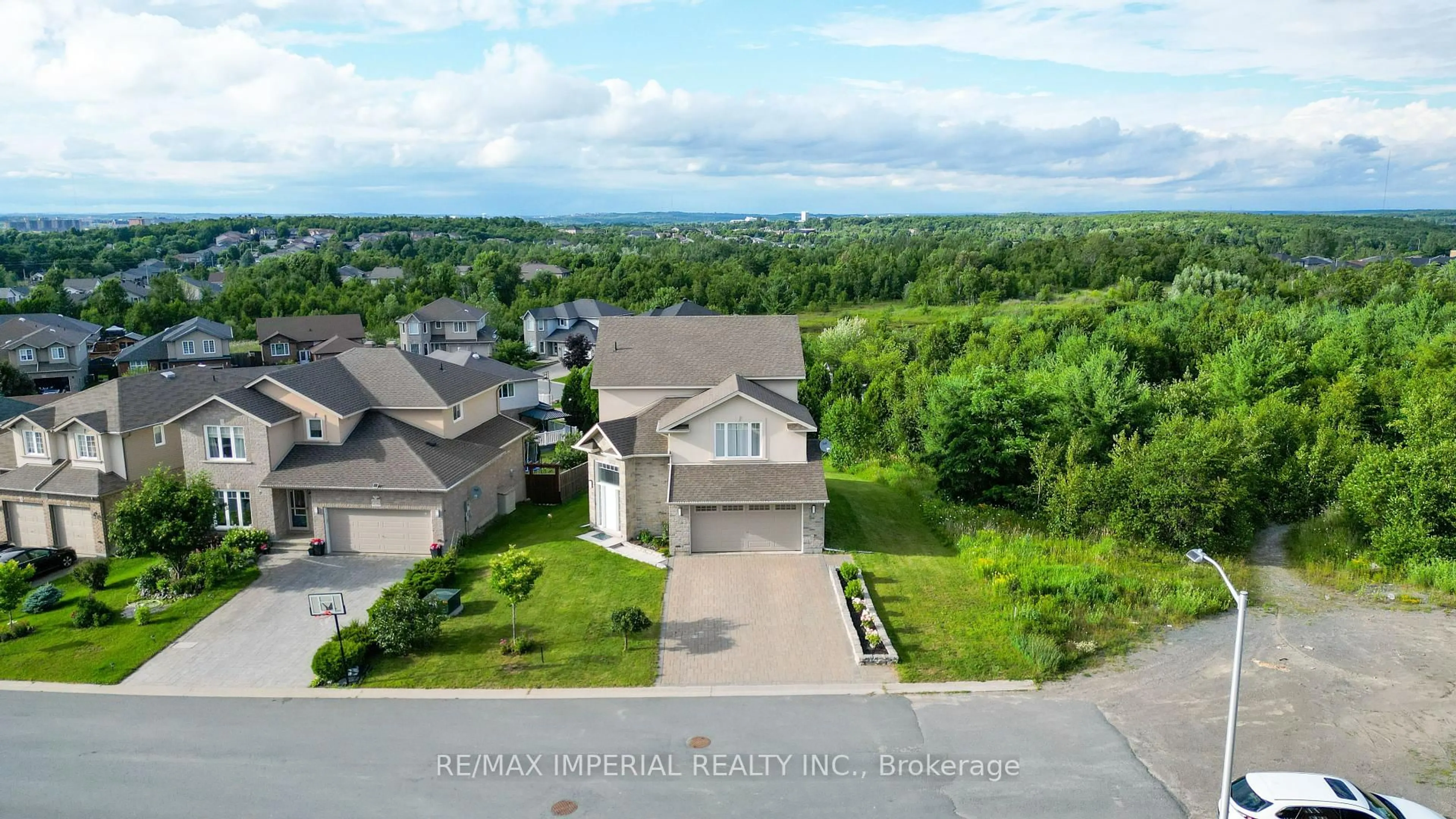 A pic from outside/outdoor area/front of a property/back of a property/a pic from drone, water/lake/river/ocean view for 254 Tuscany Tr, Greater Sudbury Ontario P3E 0E8