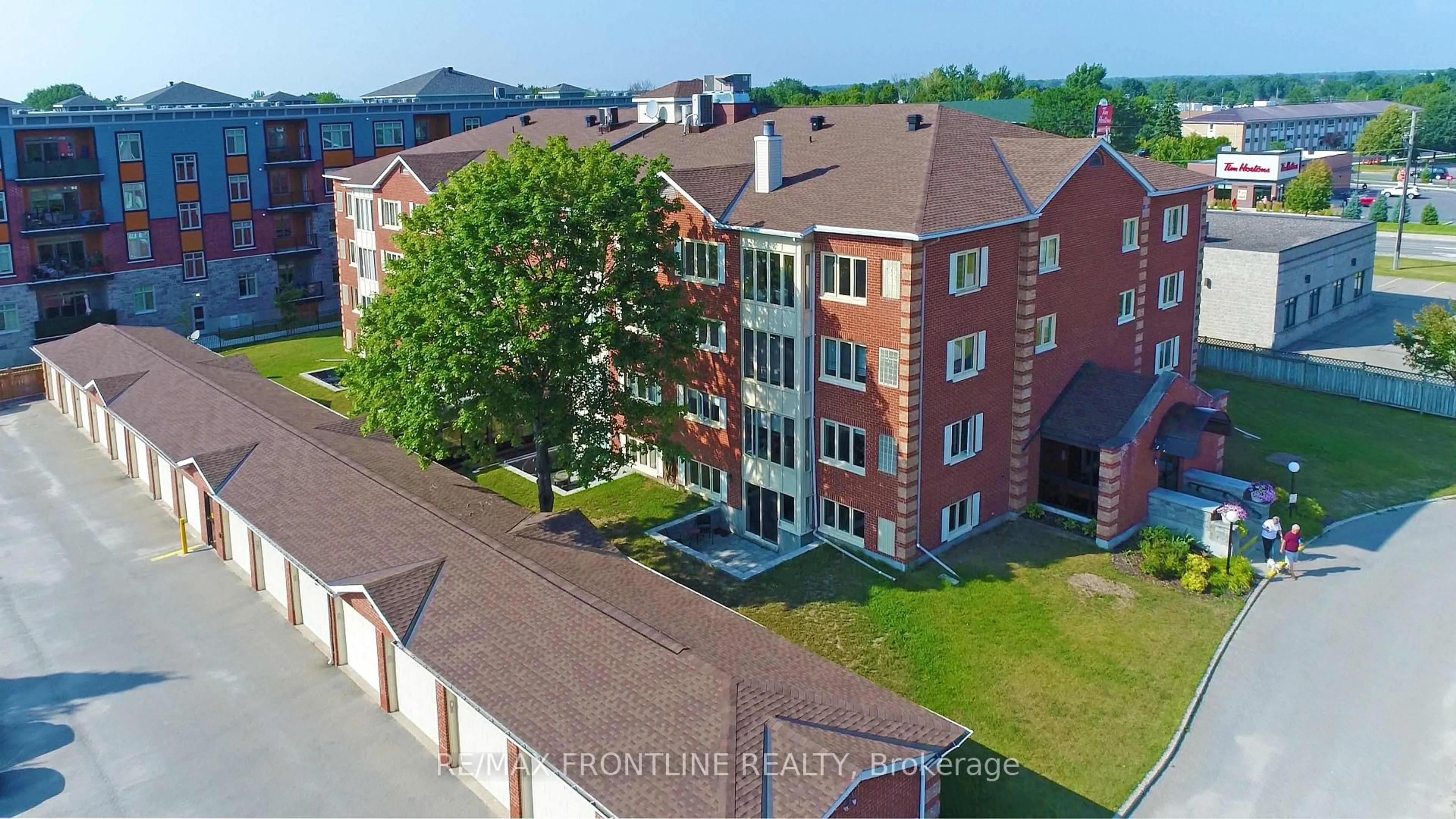 A pic from outside/outdoor area/front of a property/back of a property/a pic from drone, building for 10 ARMSTRONG Dr #Unit #302, Smiths Falls Ontario K7A 5H8