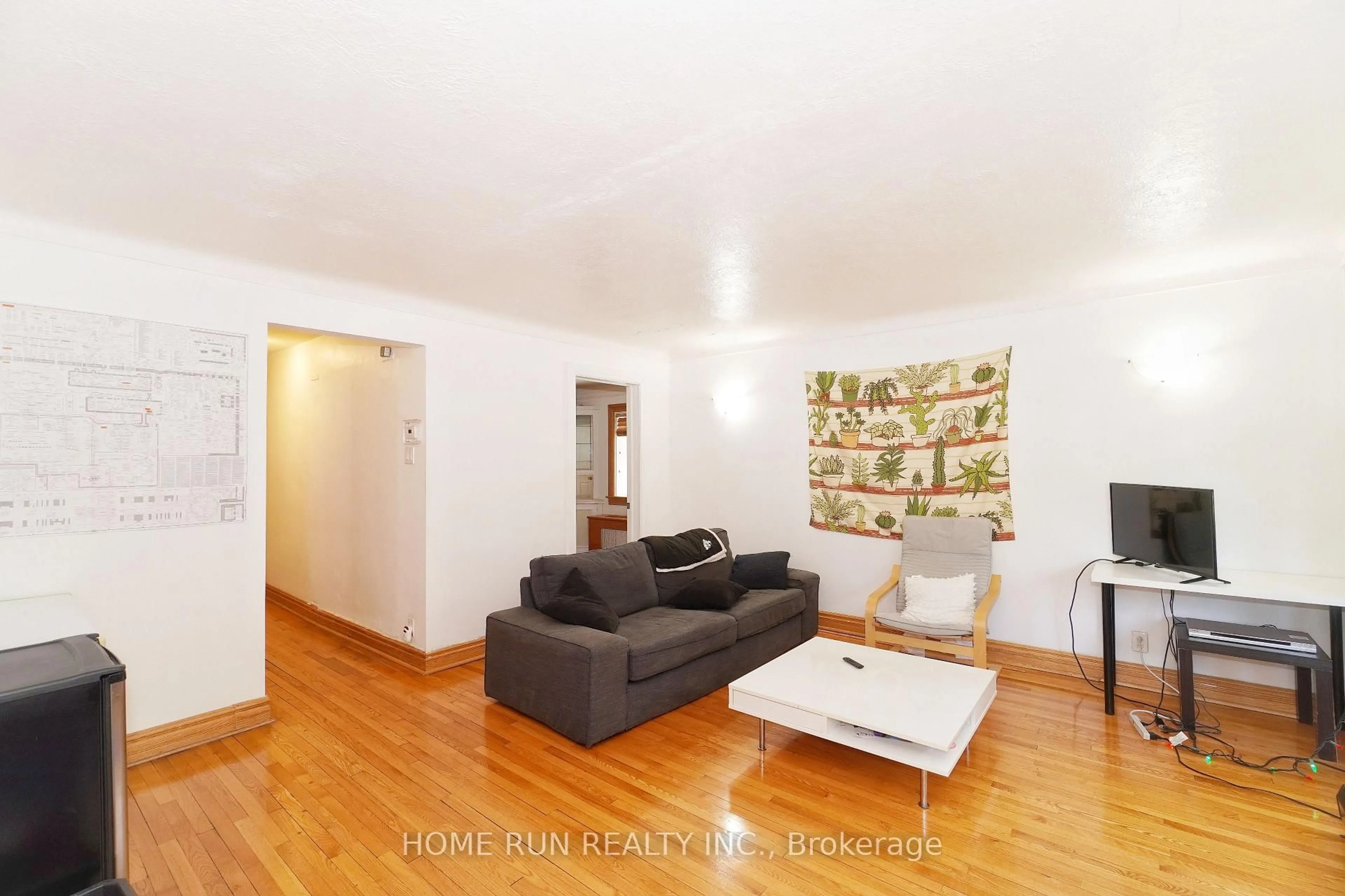 Living room with furniture, wood/laminate floor for 81 Marlborough Ave, Ottawa Ontario K1N 8E8