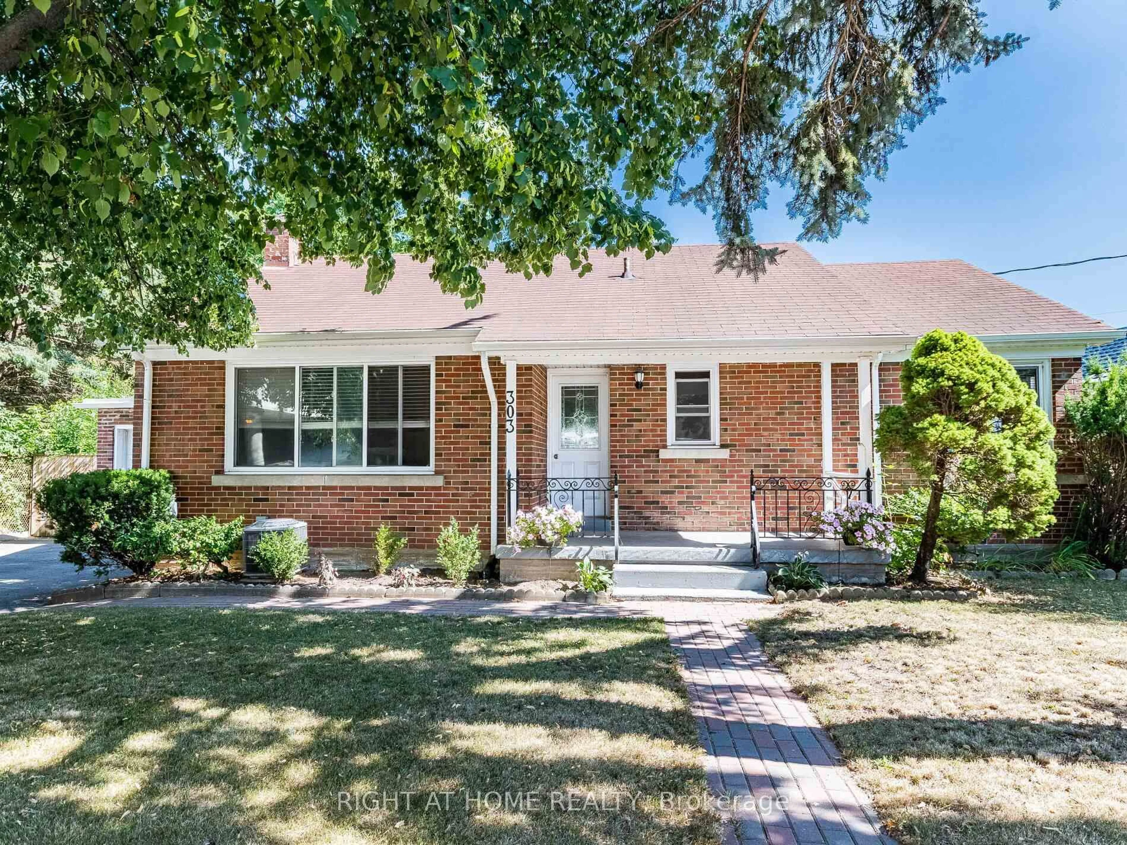 Home with brick exterior material, street for 303 KRUG St, Kitchener Ontario N2H 2Y9