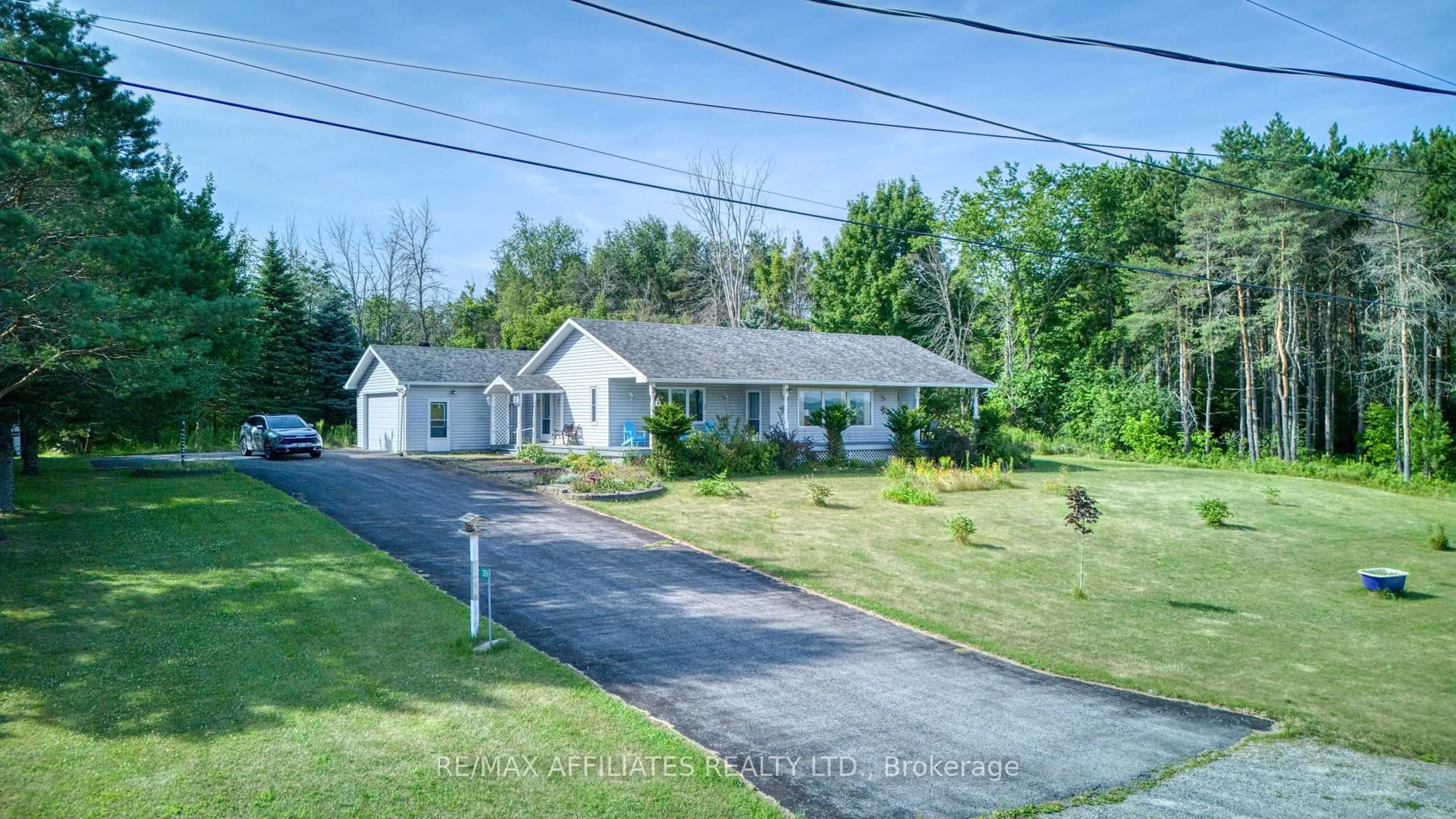 A pic from outside/outdoor area/front of a property/back of a property/a pic from drone, street for 39 Trotters Lane, Rideau Lakes Ontario K0G 1X0