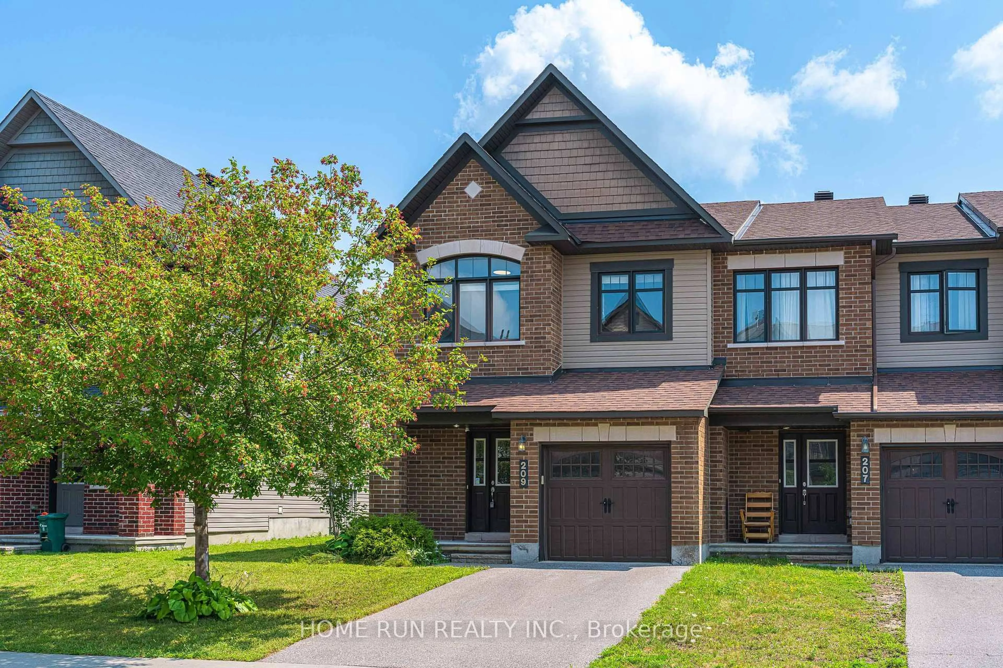 Home with brick exterior material, street for 209 Halyard Way, Ottawa Ontario K2T 0L2