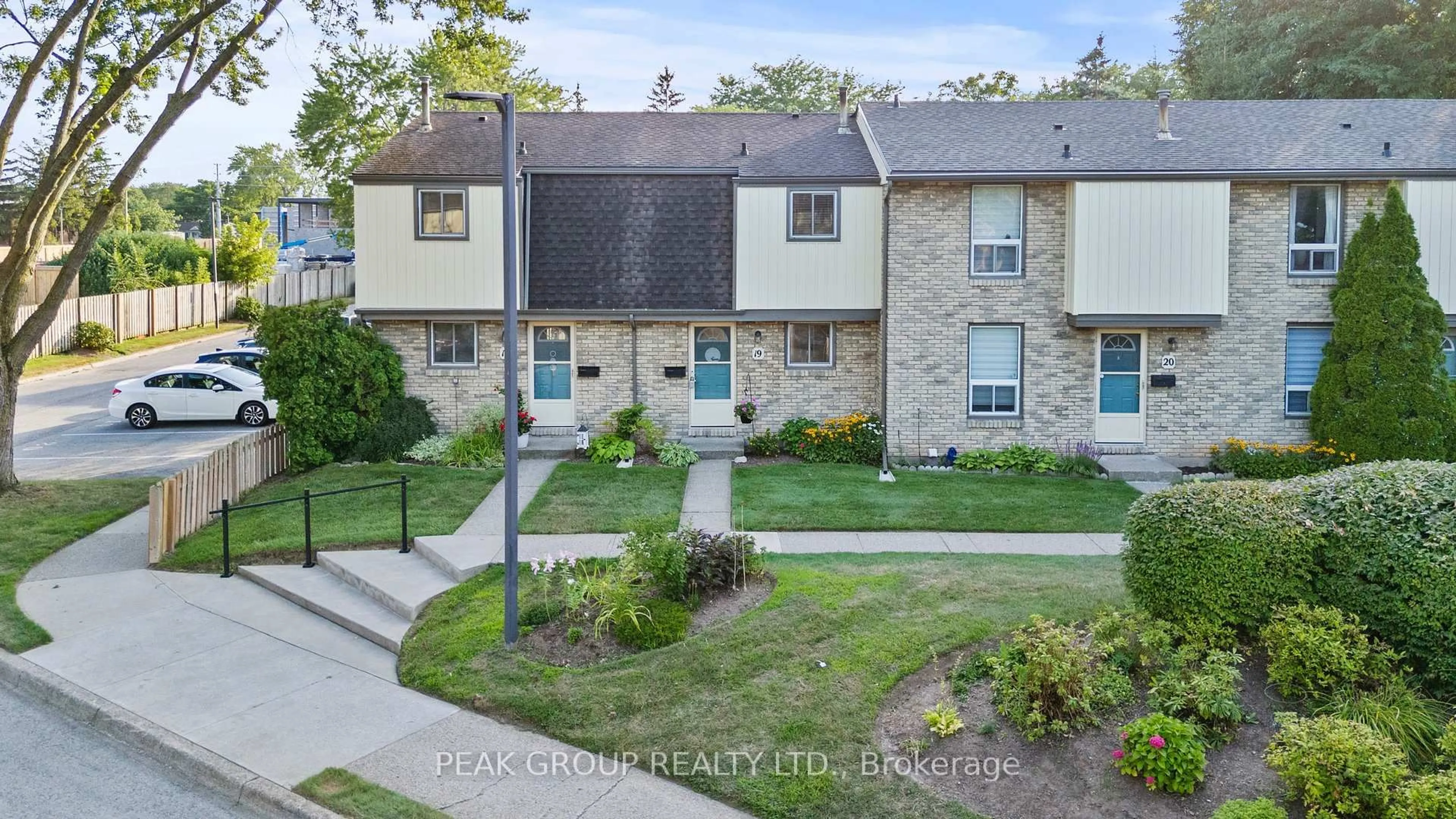 A pic from outside/outdoor area/front of a property/back of a property/a pic from drone, street for 302 Vine St #19, St. Catharines Ontario L2M 7M6