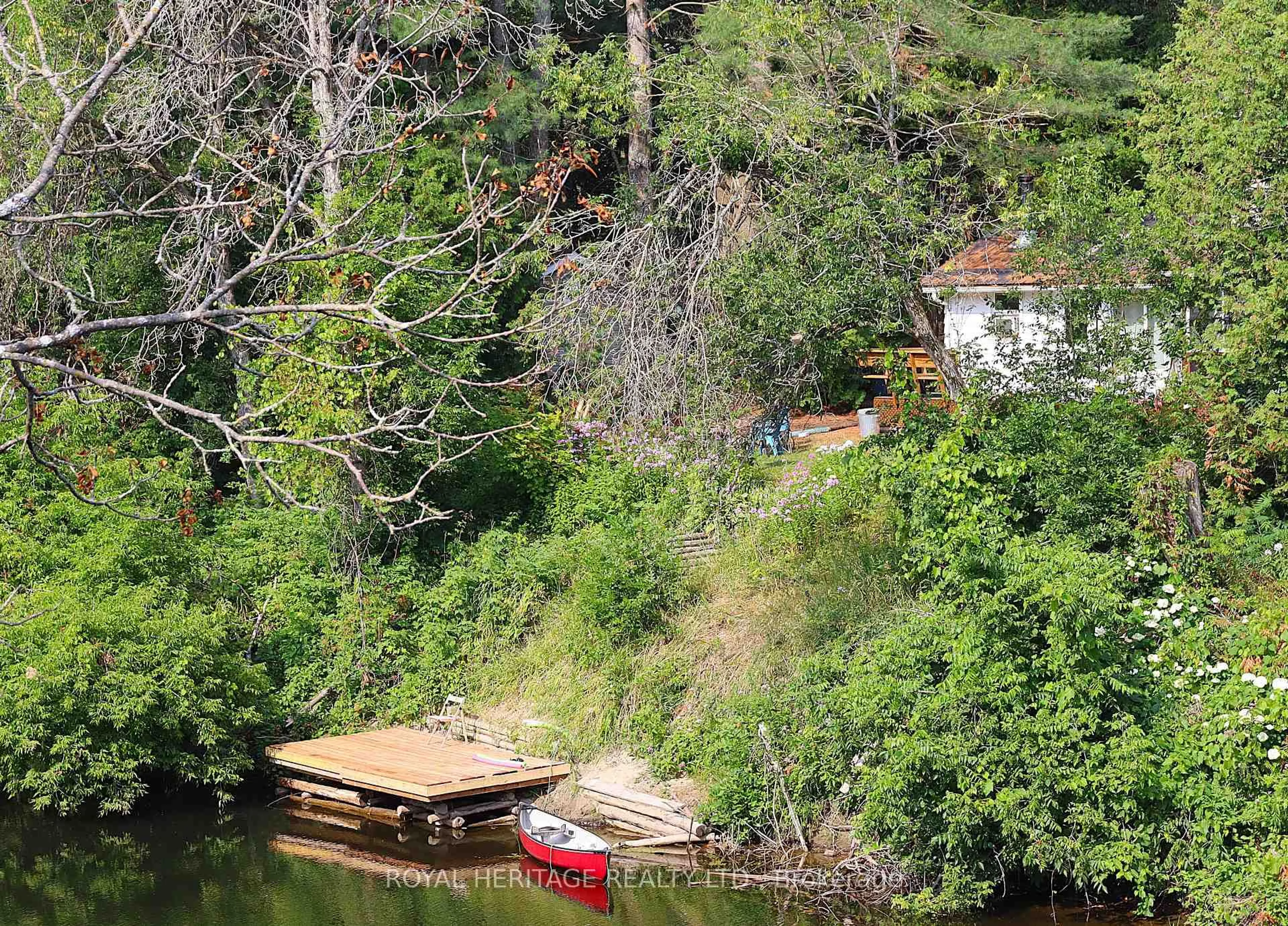 A pic from outside/outdoor area/front of a property/back of a property/a pic from drone, water/lake/river/ocean view for 3 Basswood Dr, Kawartha Lakes Ontario K0M 1C0