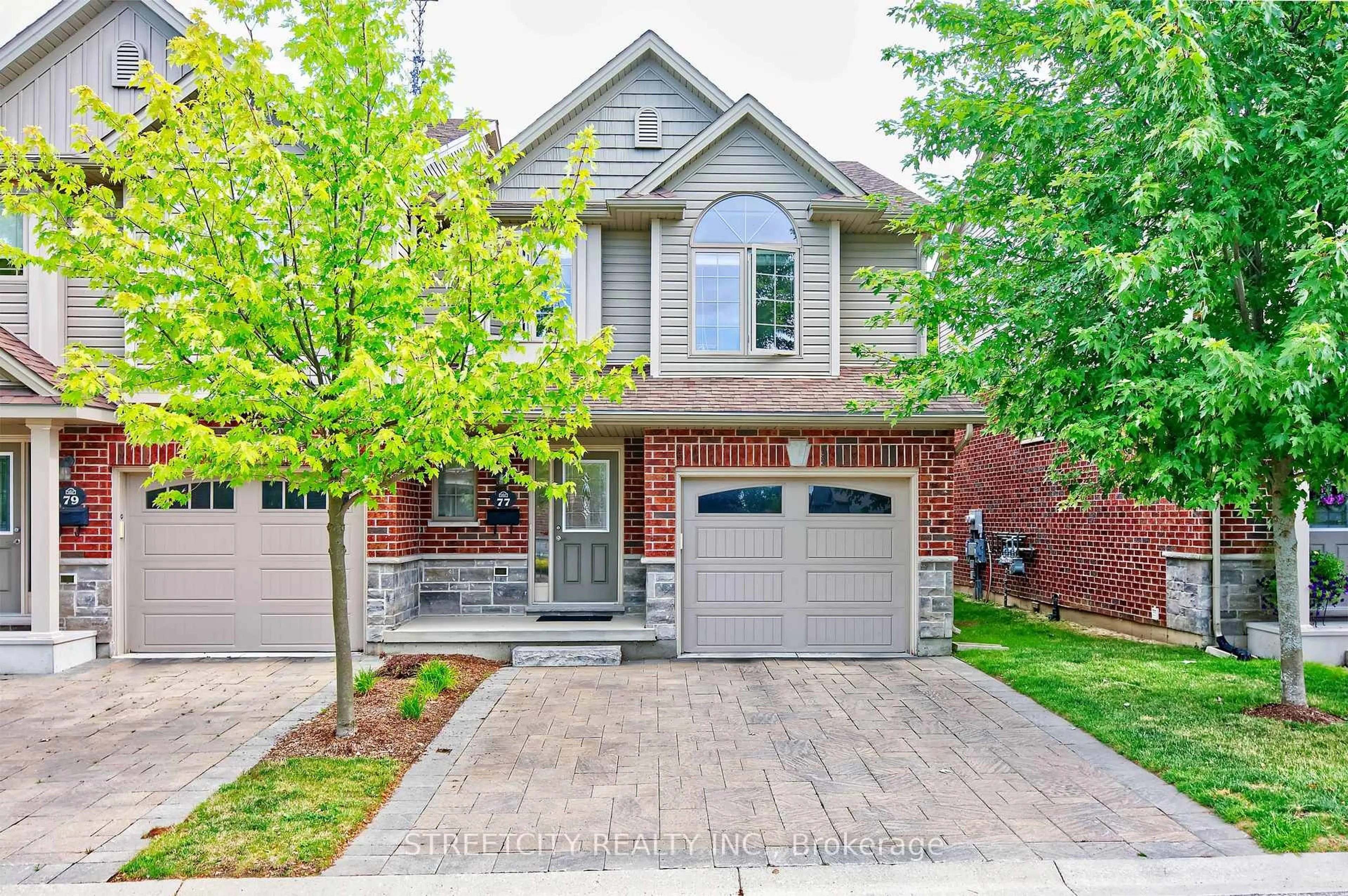 Home with brick exterior material, street for 1061 Eagletrace Dr #77, London North Ontario N6G 0T3