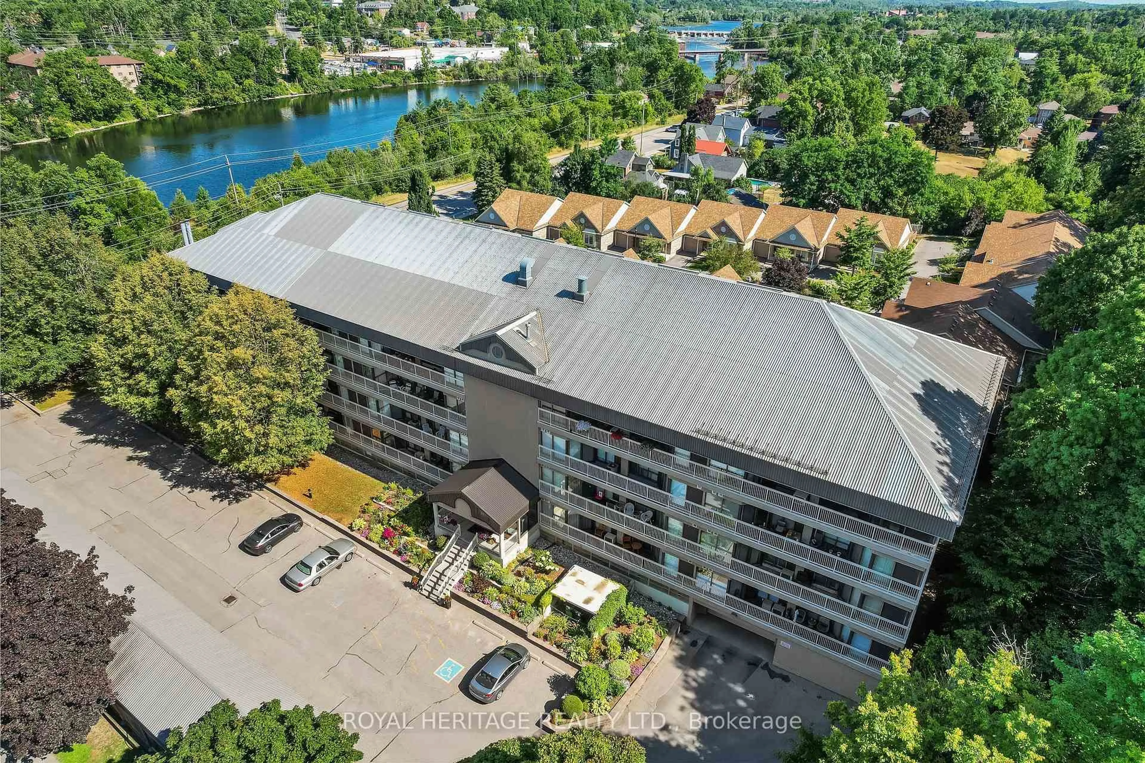 A pic from outside/outdoor area/front of a property/back of a property/a pic from drone, water/lake/river/ocean view for 40 Auburn St #211, Peterborough East Ontario K9H 2G2