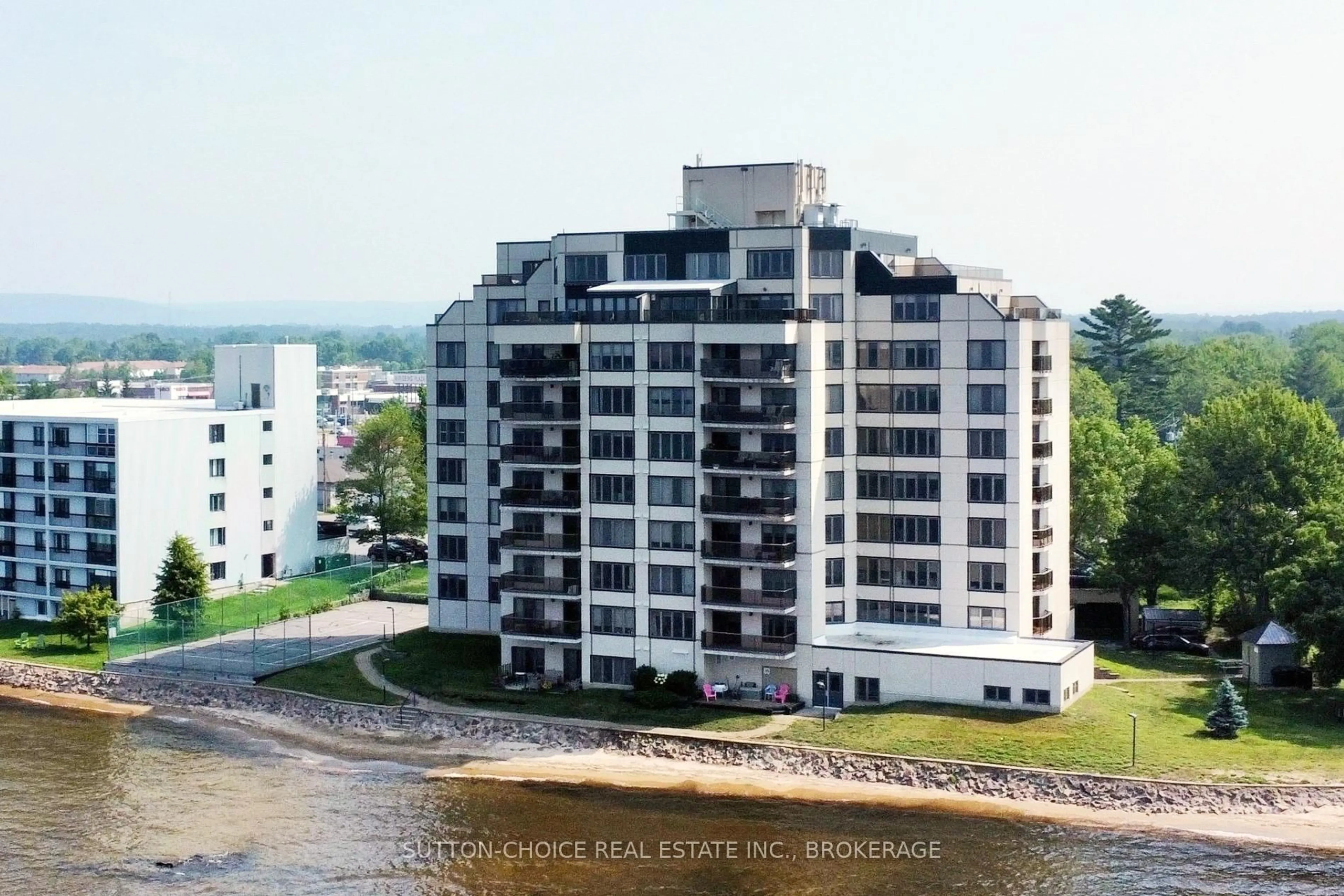 A pic from outside/outdoor area/front of a property/back of a property/a pic from drone, water/lake/river/ocean view for 441 WILLIAM St #703, North Bay Ontario P1A 1X6