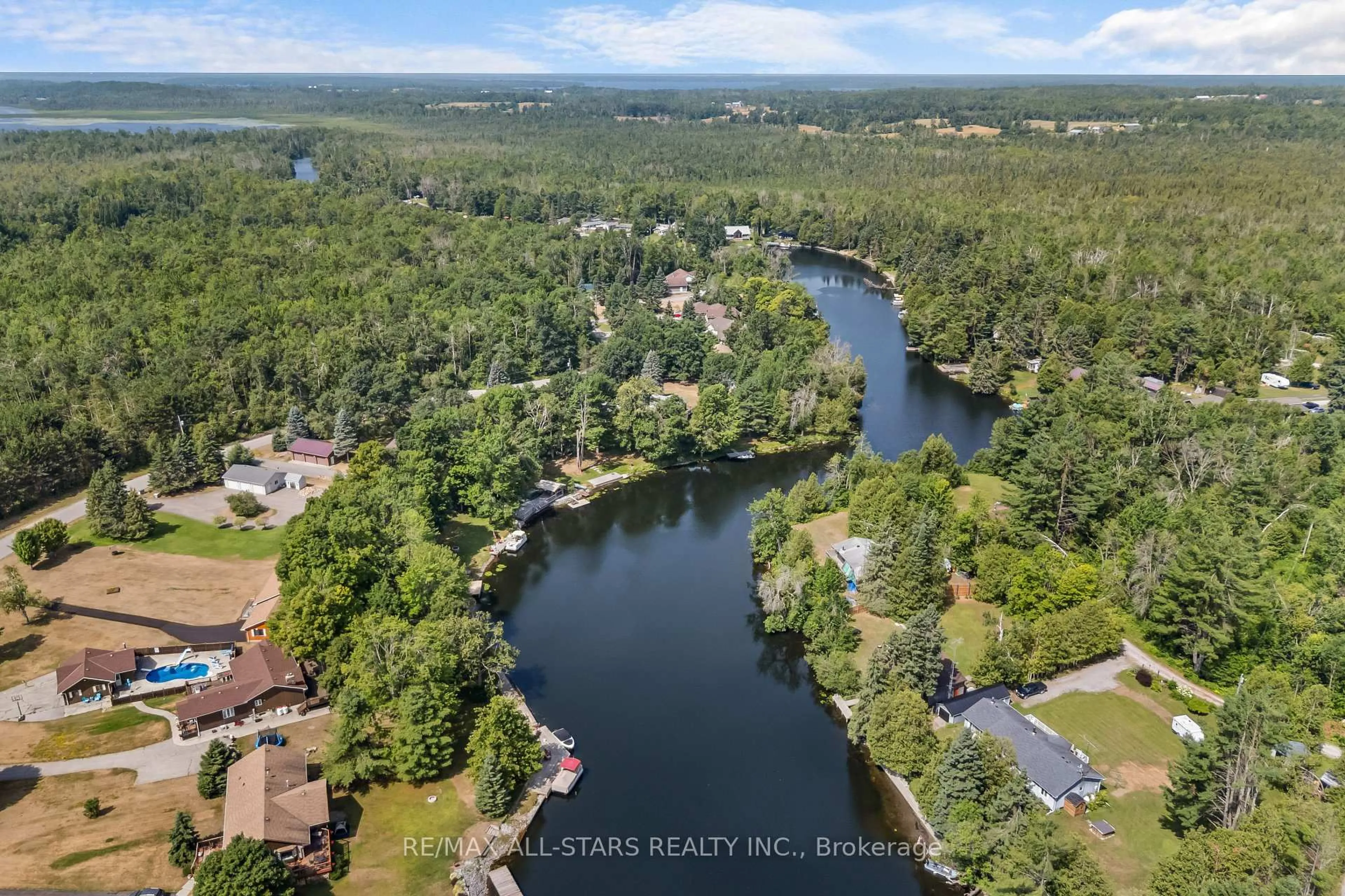 A pic from outside/outdoor area/front of a property/back of a property/a pic from drone, water/lake/river/ocean view for 29 Aspen Dr, Kawartha Lakes Ontario K0M 1A0