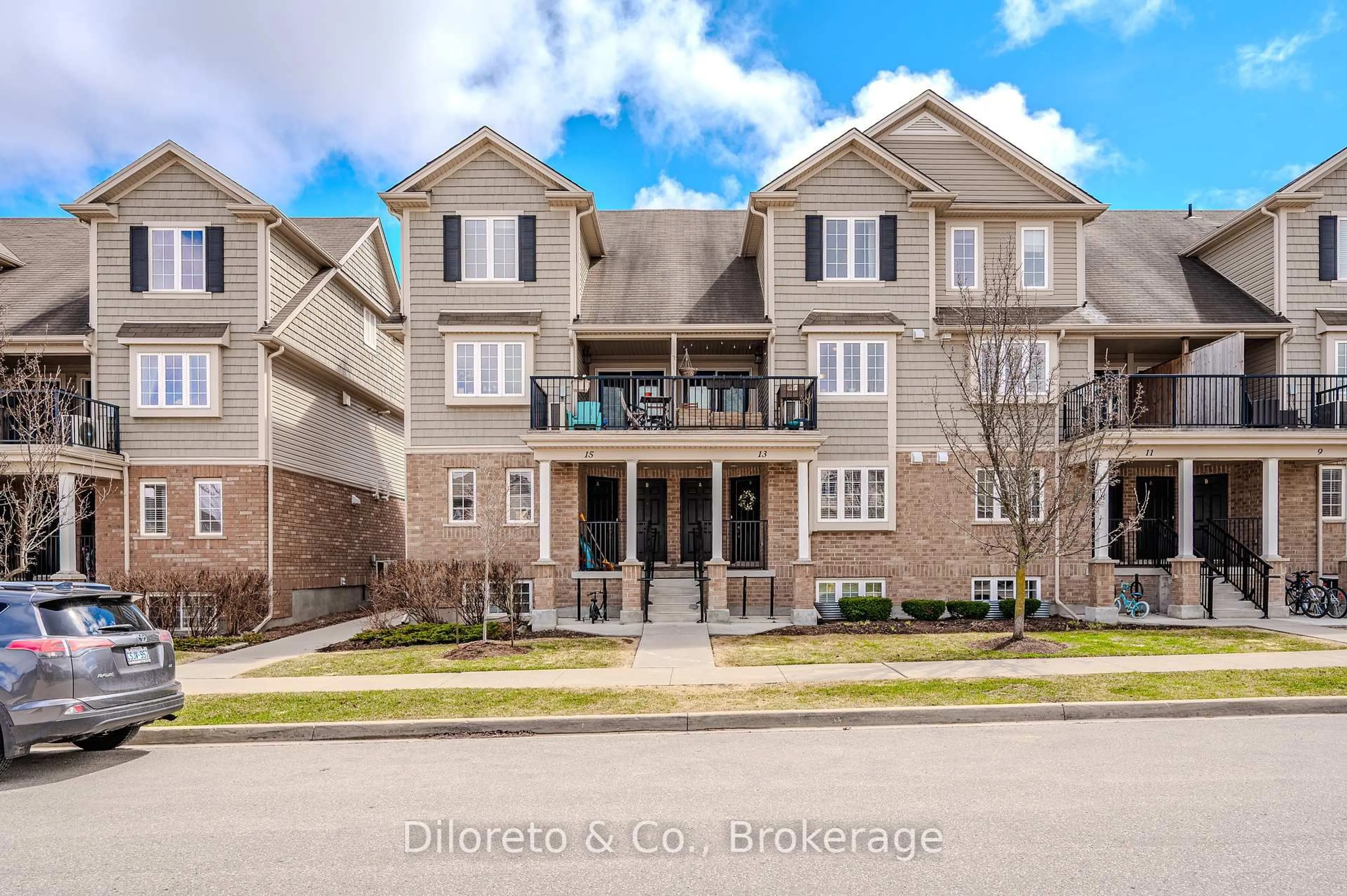 A pic from outside/outdoor area/front of a property/back of a property/a pic from drone, street for 15 Carere Cres #13A, Guelph Ontario N1E 0K4