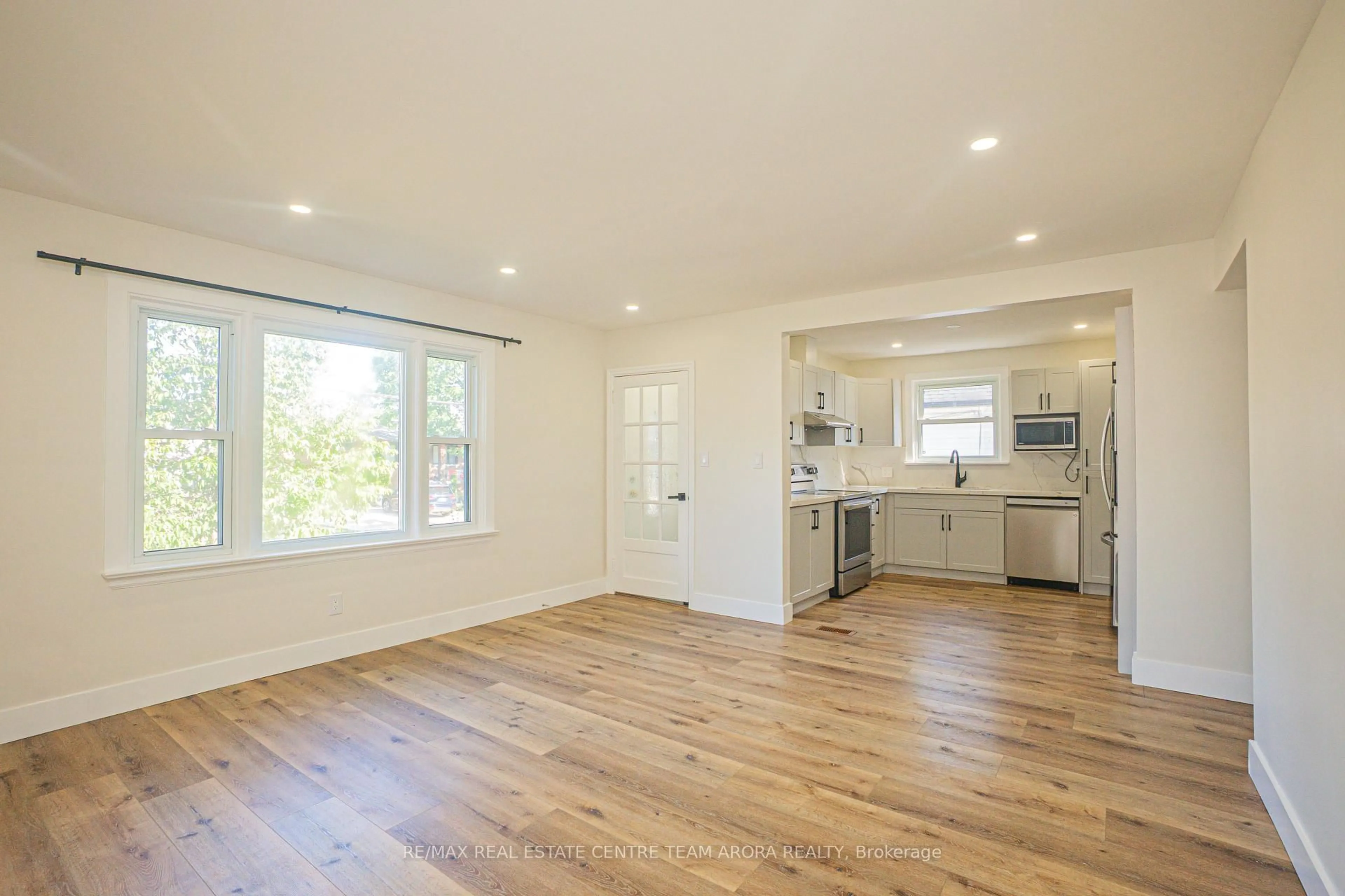Open concept kitchen, wood/laminate floor for 178 Cloverdale Ave, Hamilton Ontario L8K 4M3