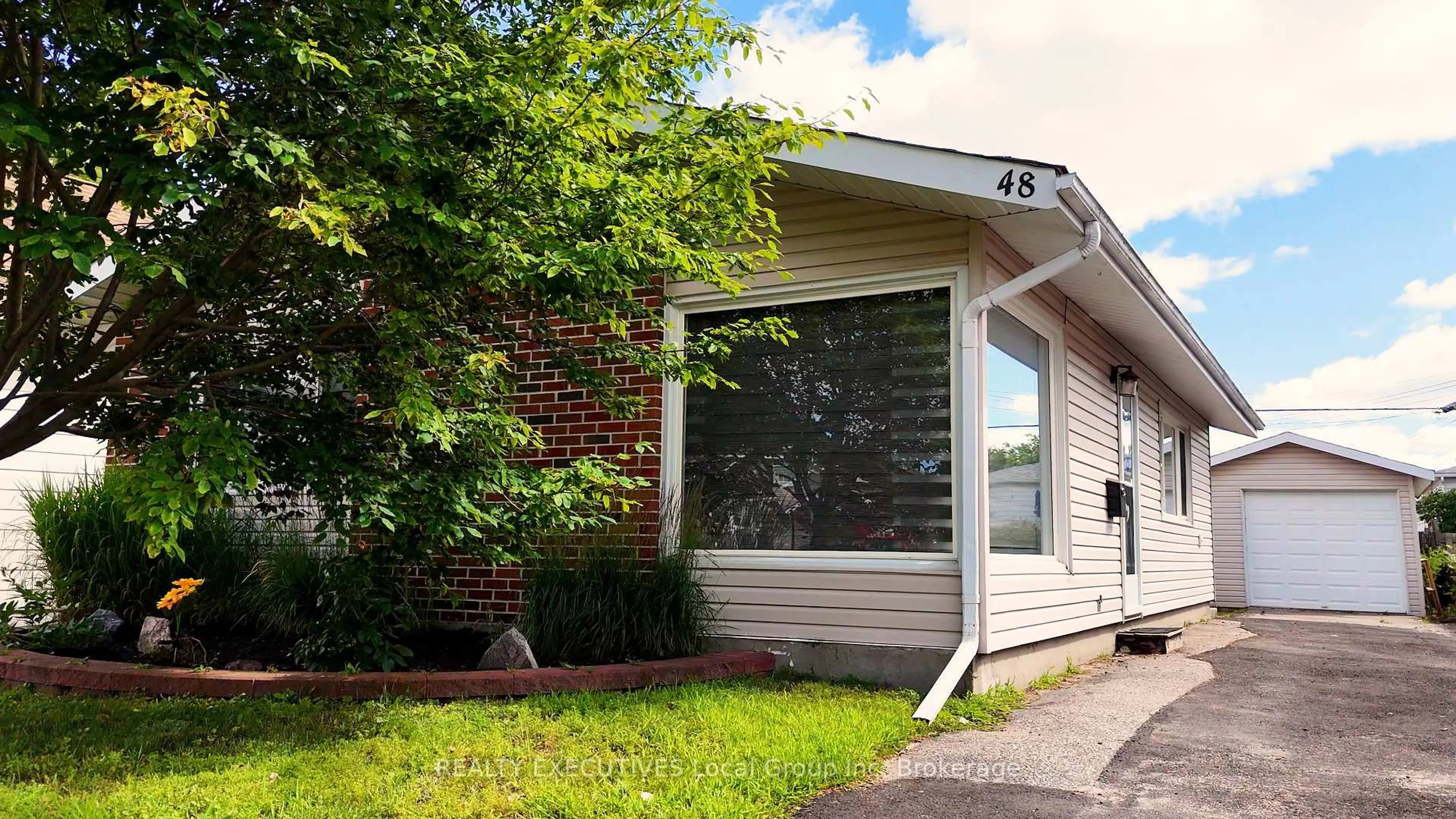 Home with vinyl exterior material, street for 48 LEE Ave, North Bay Ontario P1A 2J7