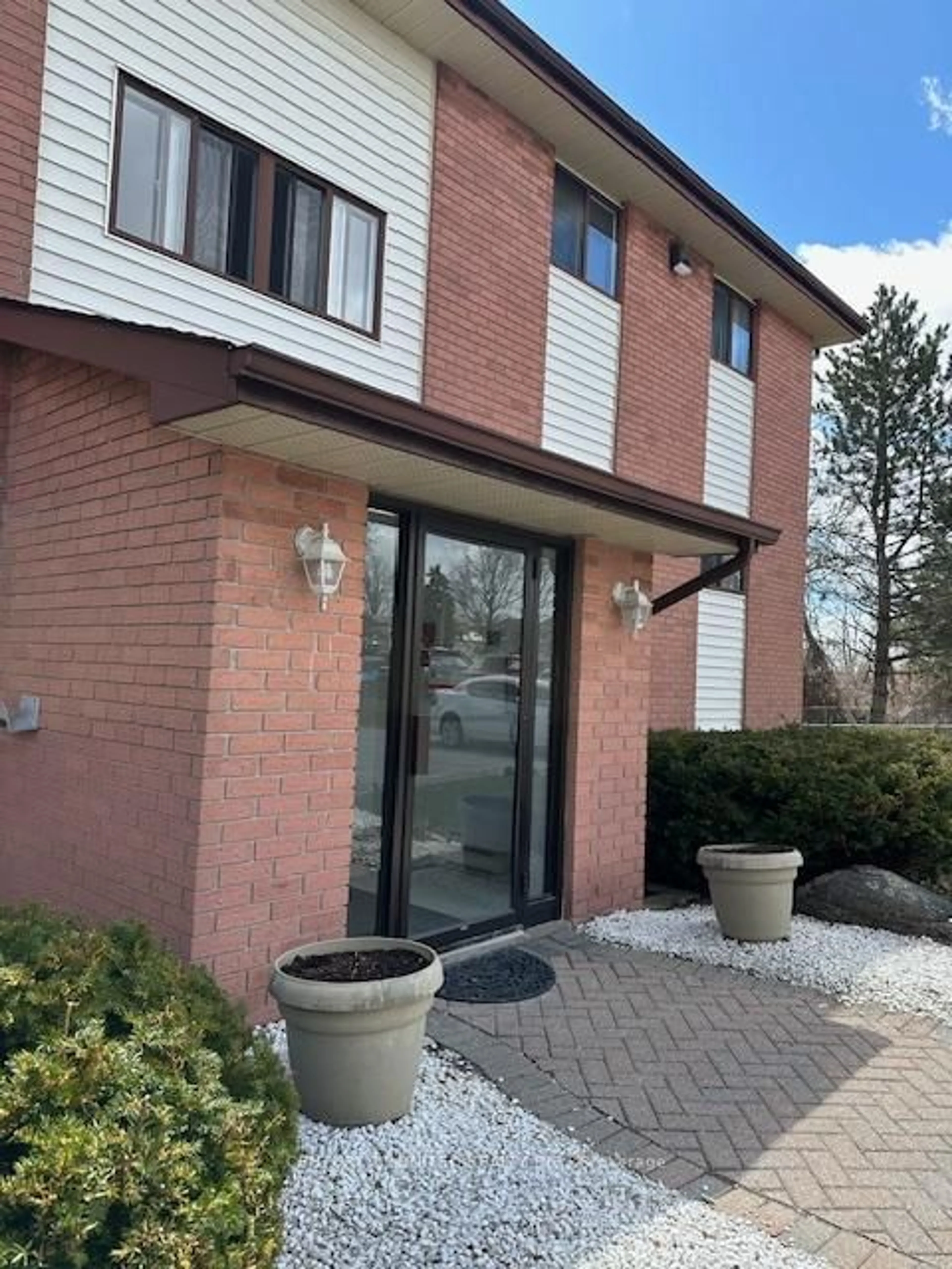 Home with brick exterior material, street for 1429 Clearview Dr #304, Peterborough West Ontario K9K 1X8