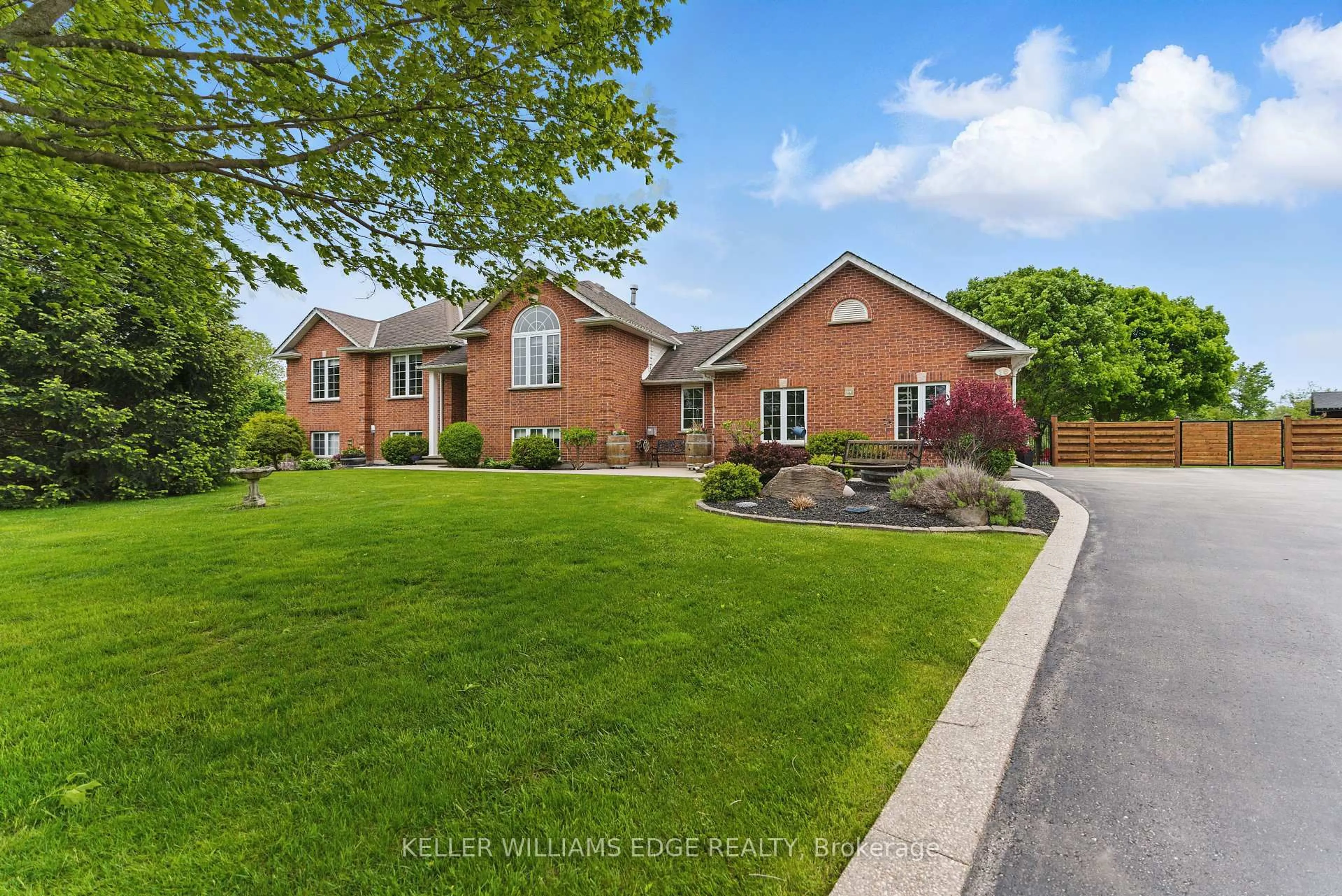Home with brick exterior material, street for 16 Credit River Rd, Erin Ontario N0B 1T0